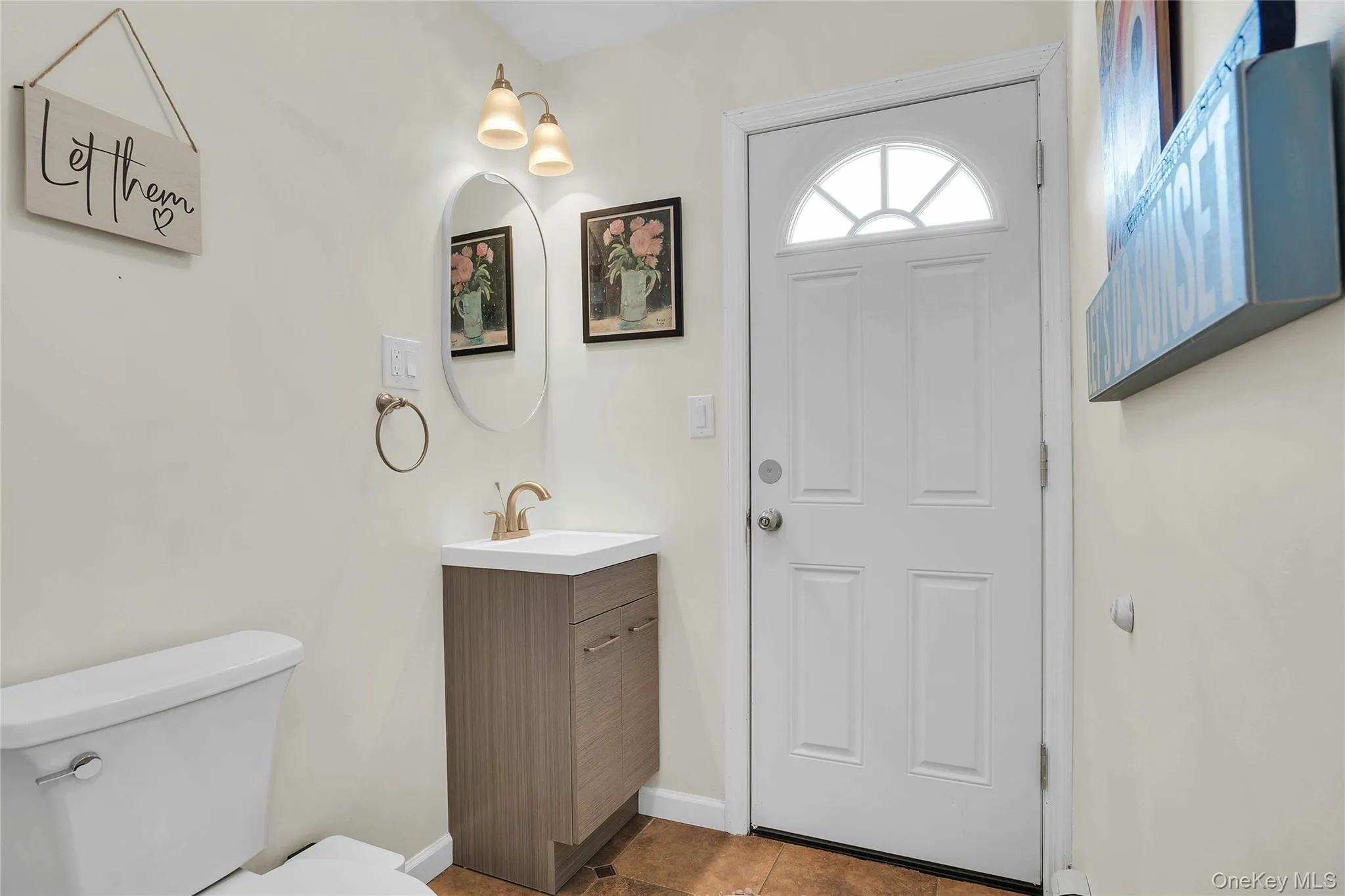 Half bath with outside entrance from the yard. Half bath with outside entrance from the yard.