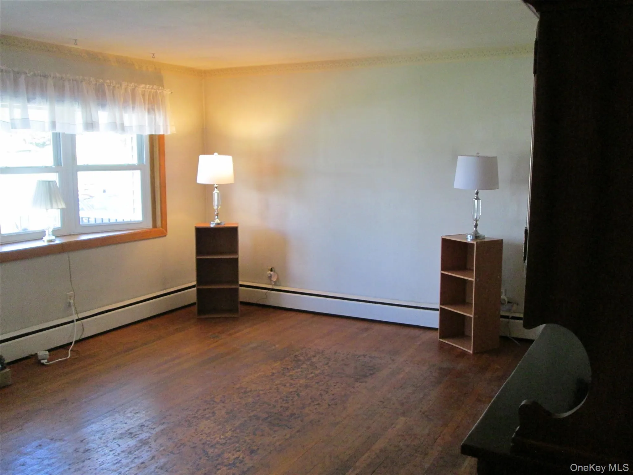 living room with bay window & hardwood floors living room with bay window & hardwood floors