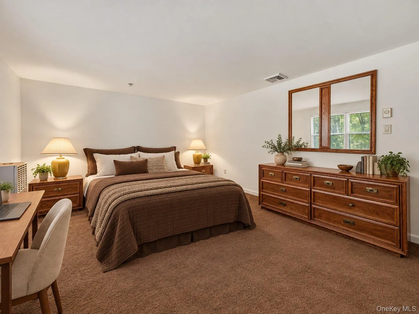 Virtually staged primary bedroom demonstrating the room’s generous dimensions and flexible furniture placement. Virtually staged primary bedroom demonstrating the room’s generous dimensions and flexible furniture placement.