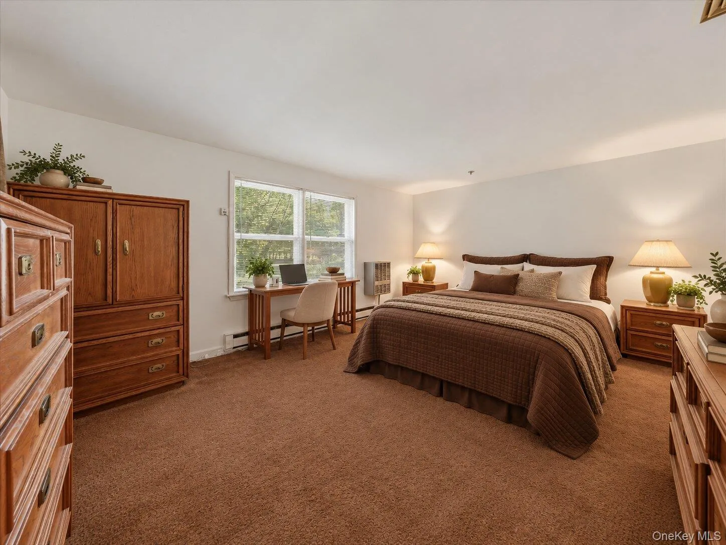 Virtually staged primary bedroom showcasing the spacious layout, natural light, and potential for a dedicated work area. Virtually staged primary bedroom showcasing the spacious layout, natural light, and potential for a dedicated work area.