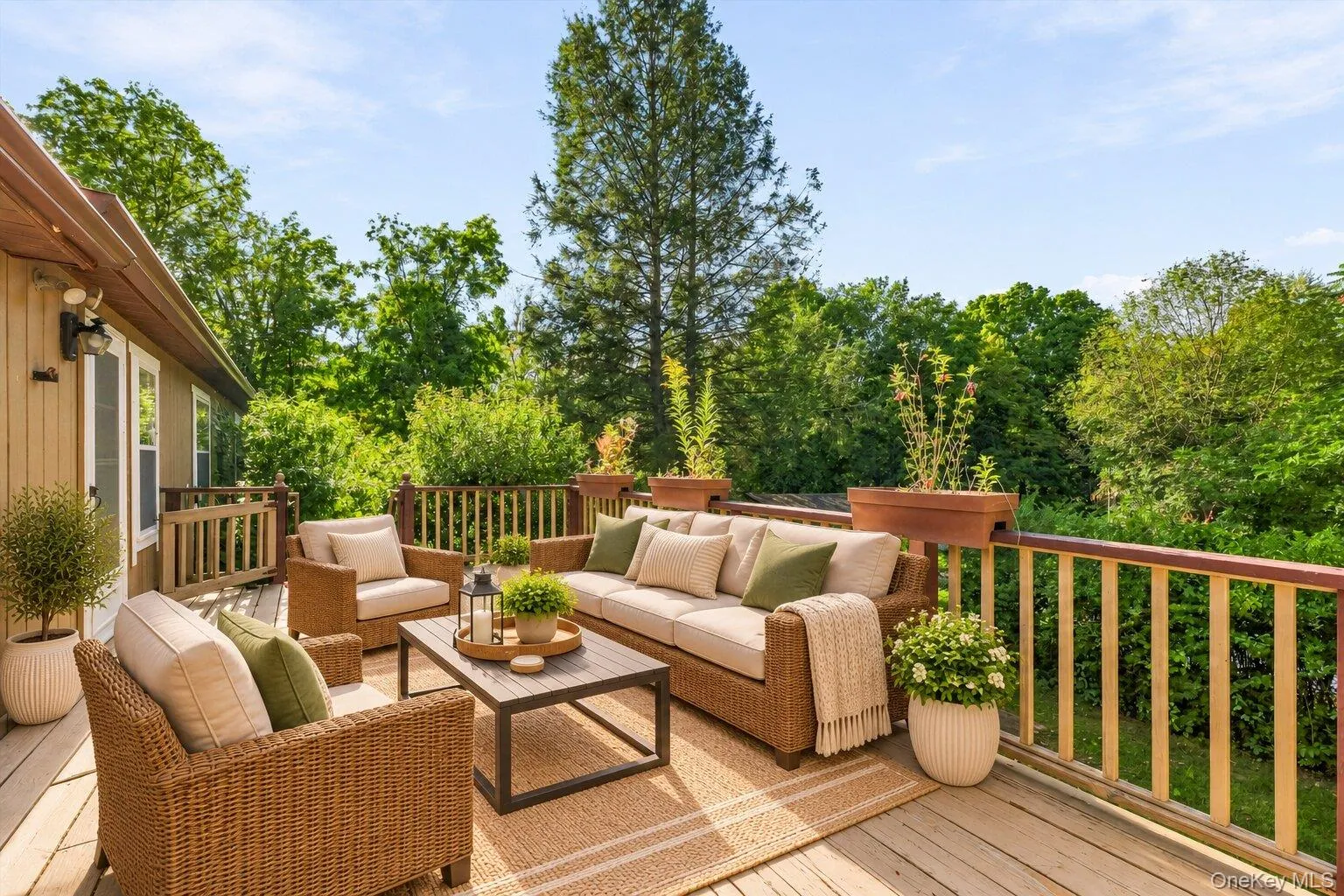 Virtually staged deck highlighting the peaceful backyard views and generous outdoor living space. Virtually staged deck highlighting the peaceful backyard views and generous outdoor living space.