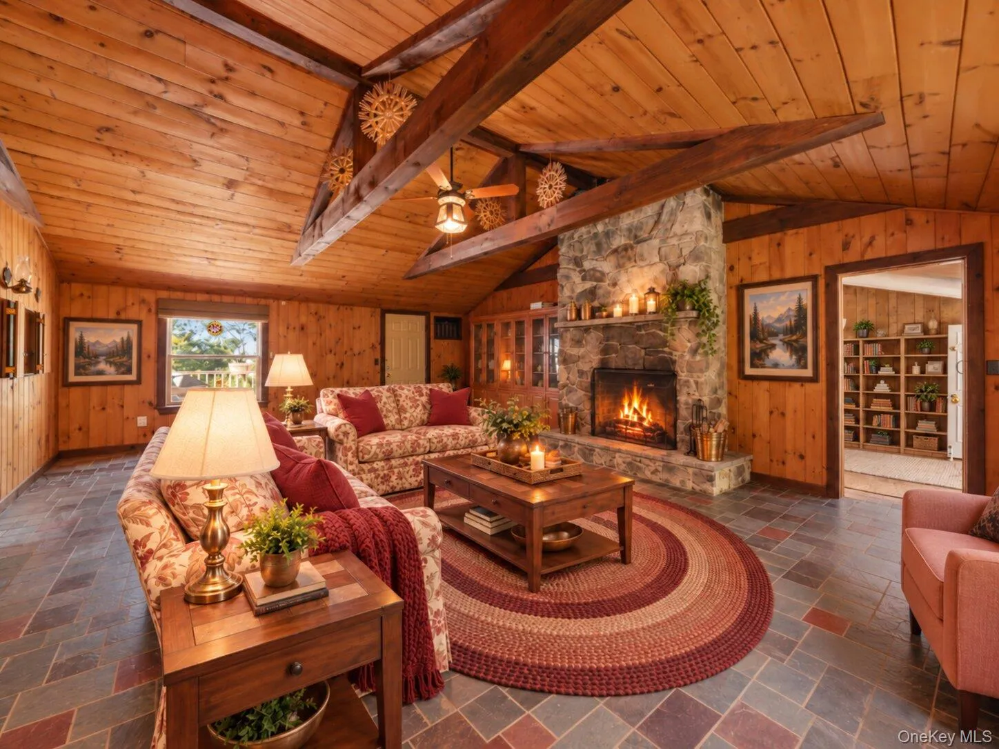Virtually staged family room demonstrating the room’s generous proportions and comfortable seating possibilities around the fireplace. Virtually staged family room demonstrating the room’s generous proportions and comfortable seating possibilities around the fireplace.