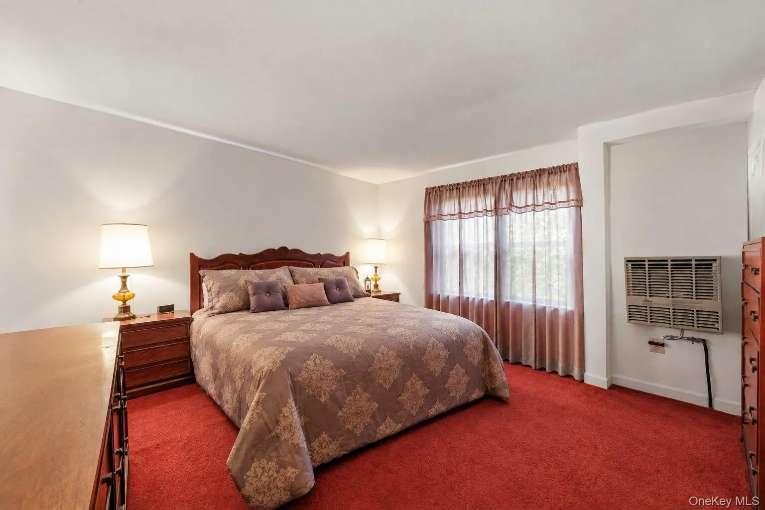 Well-sized bedroom with natural light and a flexible layout that accommodates a full bedroom suite. Well-sized bedroom with natural light and a flexible layout that accommodates a full bedroom suite.