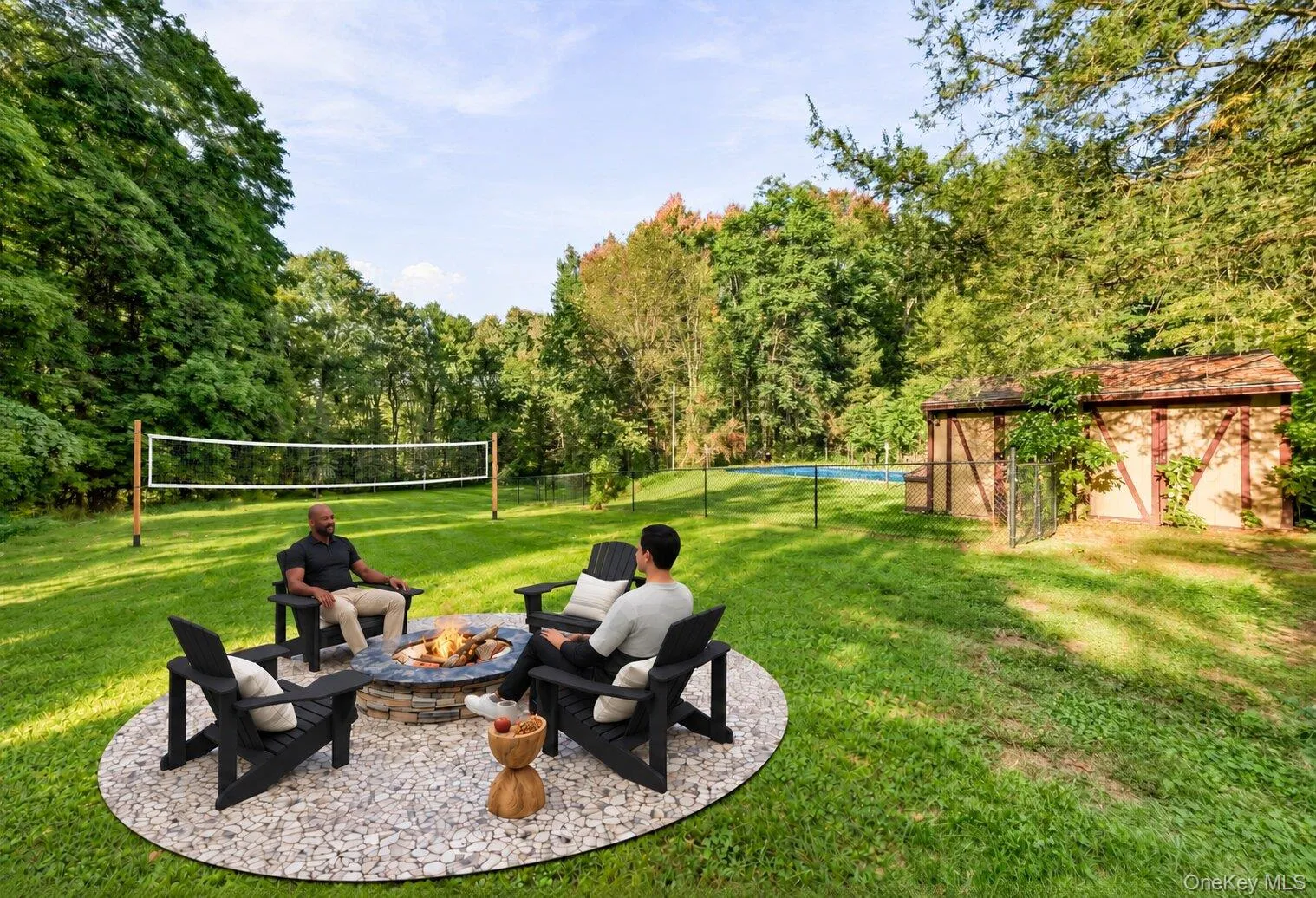 Virtually staged backyard showcasing a fire pit seating area, volleyball space, and the property’s generous lawn. Virtually staged backyard showcasing a fire pit seating area, volleyball space, and the property’s generous lawn.