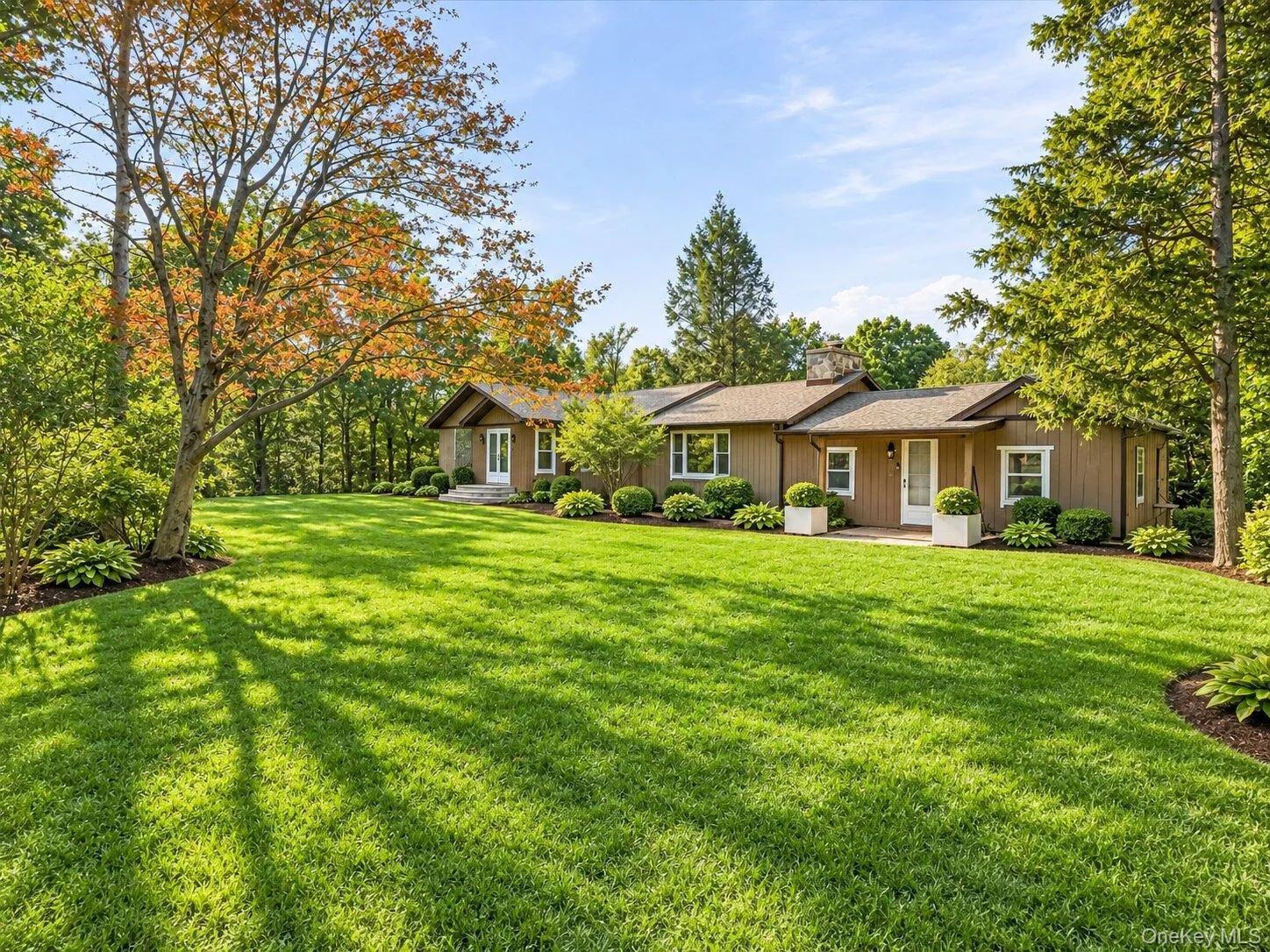 Virtually Staged. Attractive single-level home surrounded by lush landscaping and a beautifully maintained front yard. Virtually Staged. Attractive single-level home surrounded by lush landscaping and a beautifully maintained front yard.