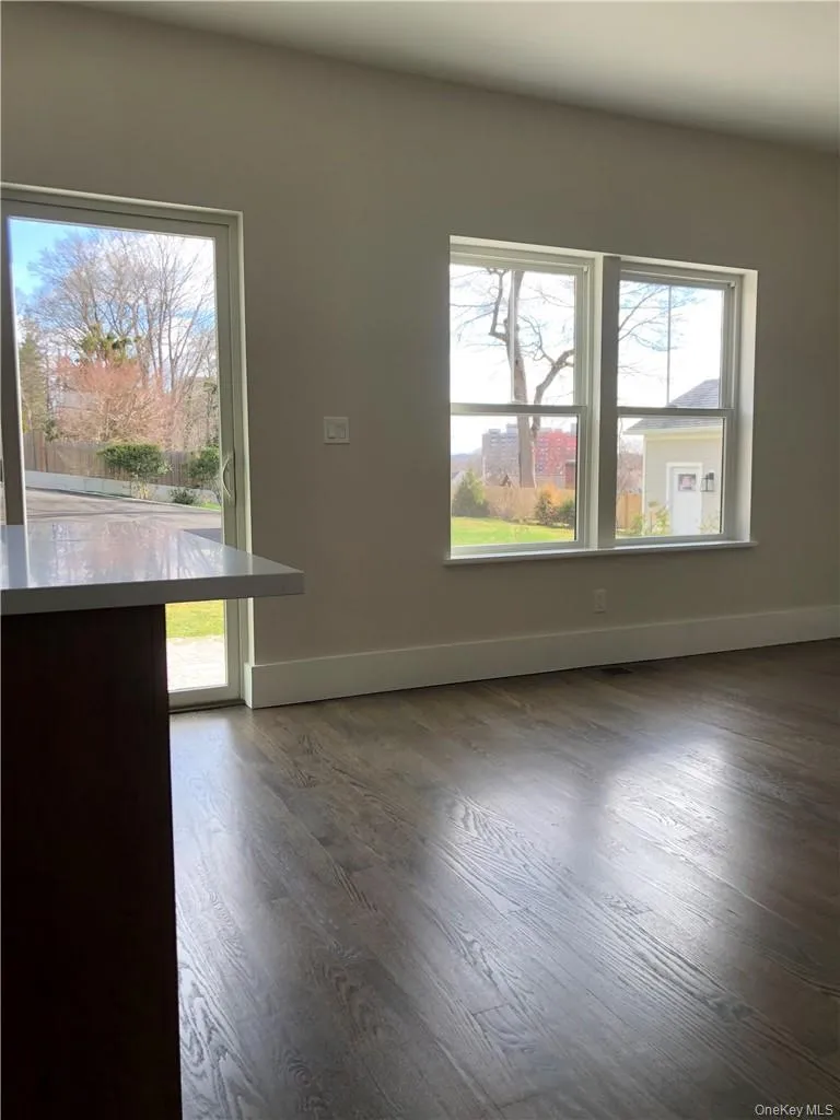 Family Room off the kitchen and view of patio and backyard Family Room off the kitchen and view of patio and backyard