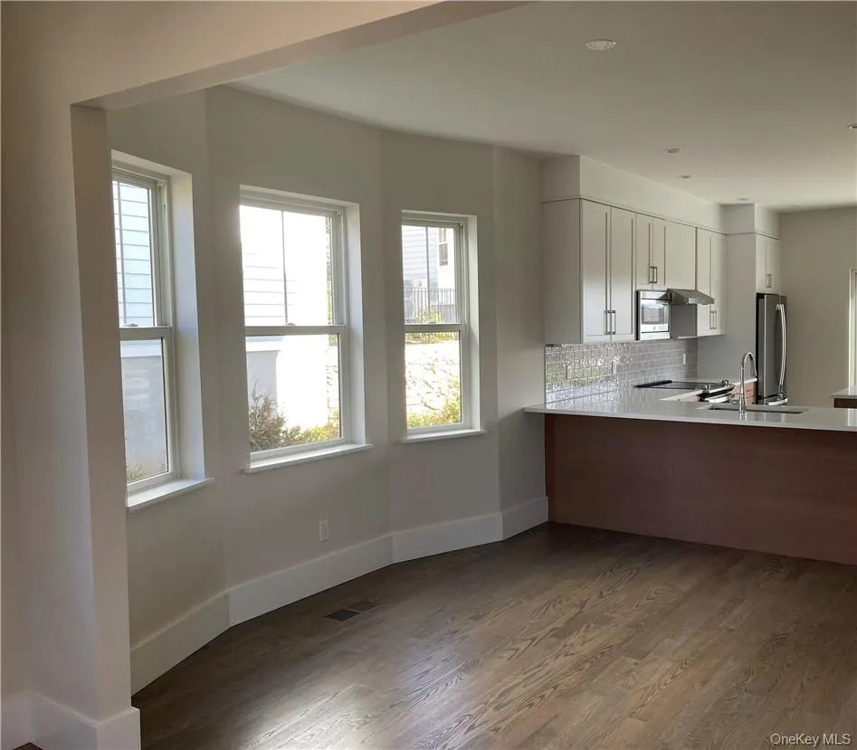 Dining area and kitchen Dining area and kitchen