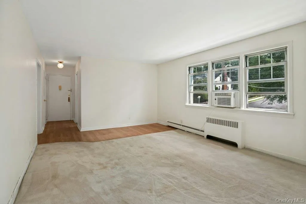 Spacious bright living room provides room for entertainment and relaxation Spacious bright living room provides room for entertainment and relaxation
