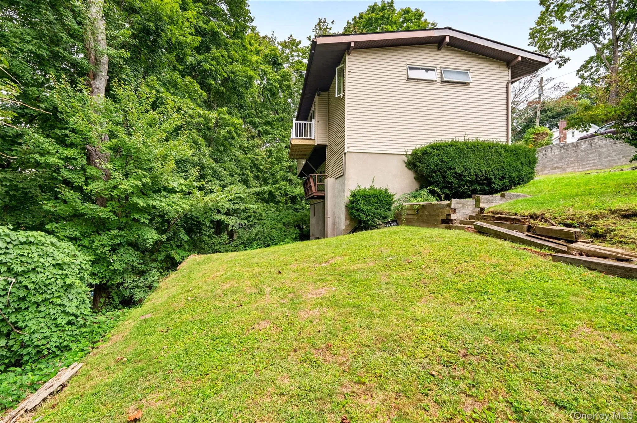 Expansive green space with mature trees and established landscaping Expansive green space with mature trees and established landscaping