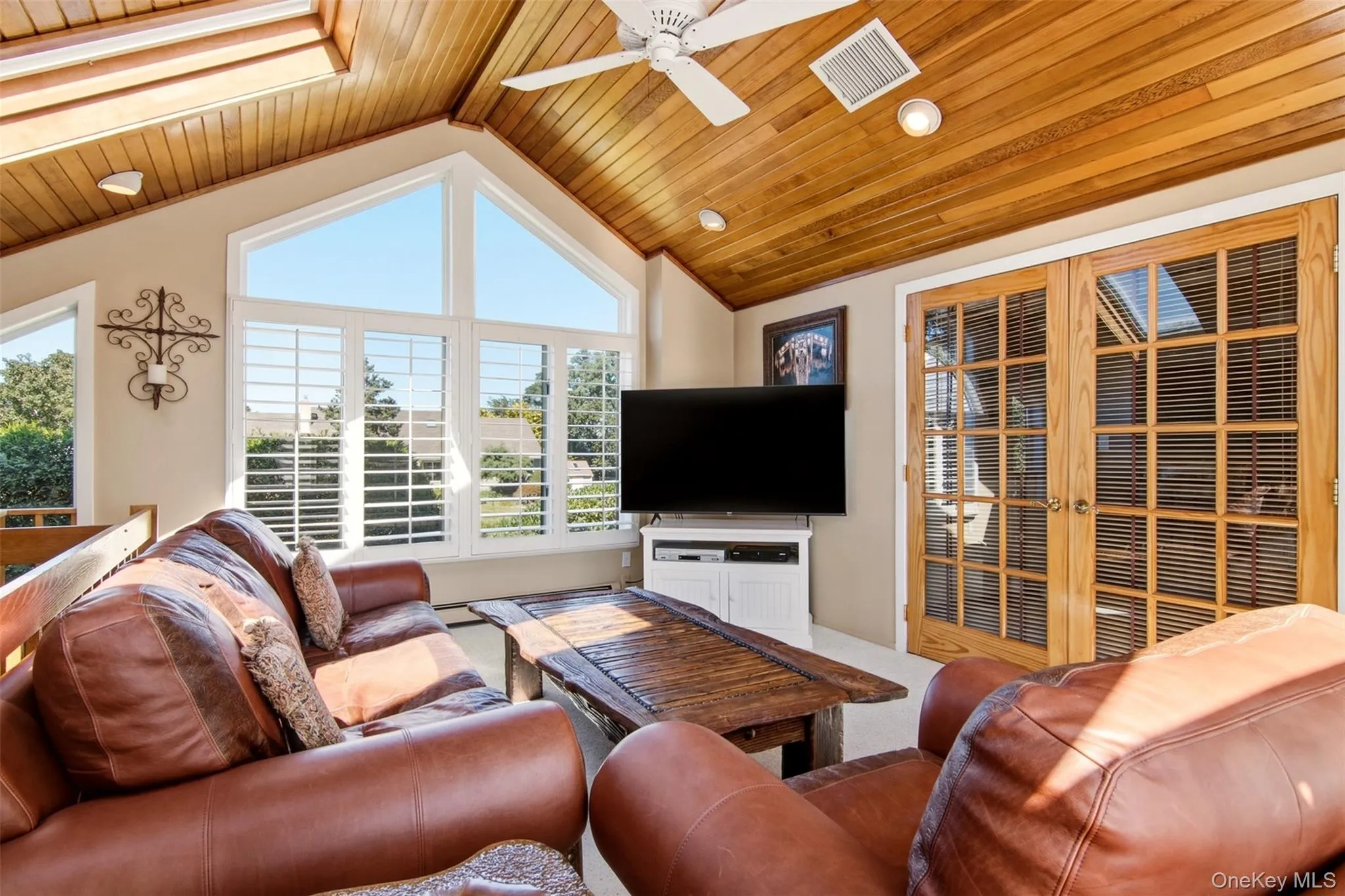 through french doors from the master suite with water view through french doors from the master suite with water view