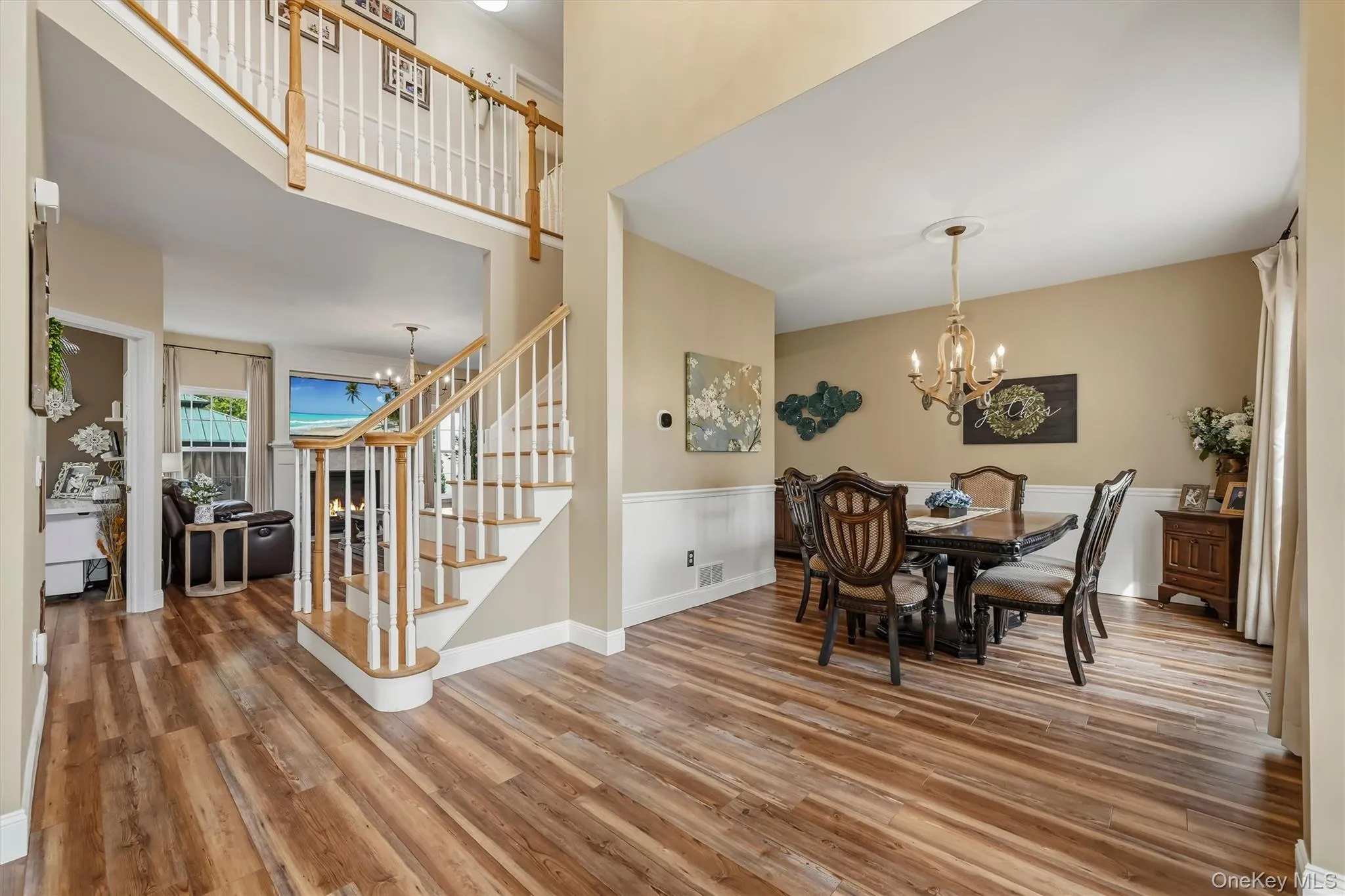The two story entrance foyer with side stairs and catwalk make quite a first impression. The two story entrance foyer with side stairs and catwalk make quite a first impression.