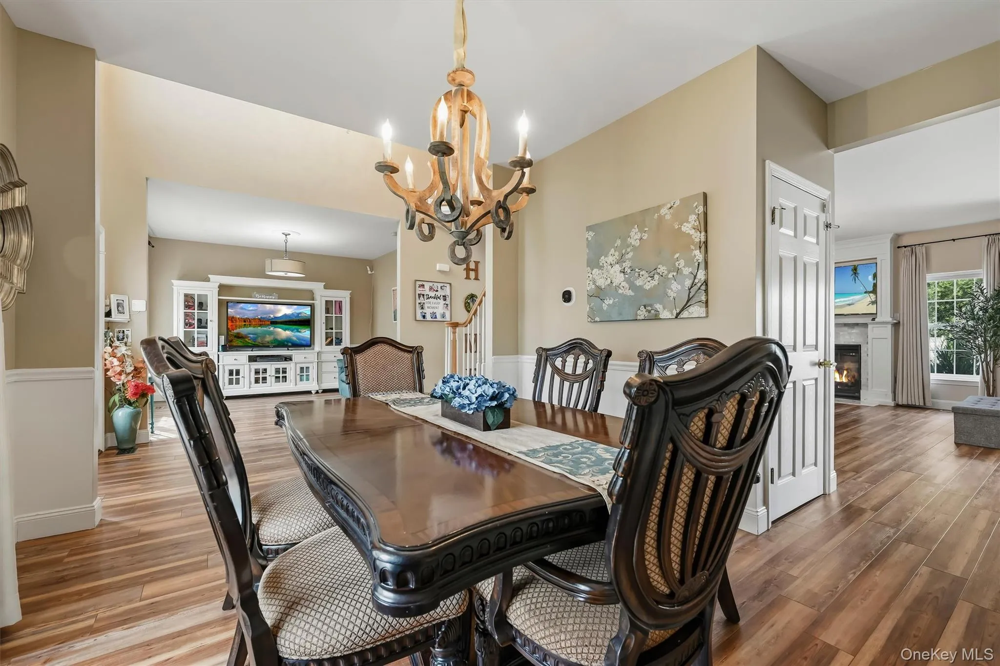 The formal dining room offers the same molding and leads into the kitchen. The door on left leads to the unfinished basement. The formal dining room offers the same molding and leads into the kitchen. The door on left leads to the unfinished basement.