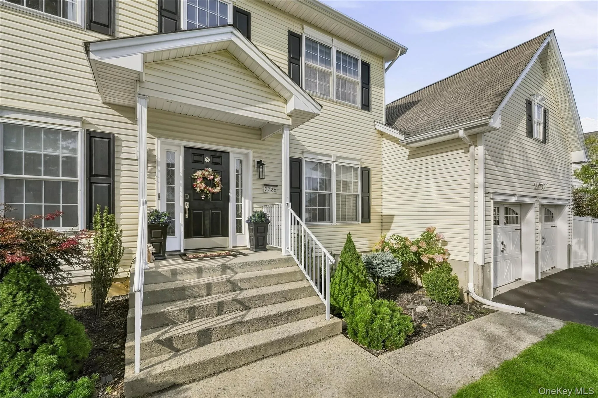 This home has a smart sprinkler system. Notice the covered steps. This home has a smart sprinkler system. Notice the covered steps.