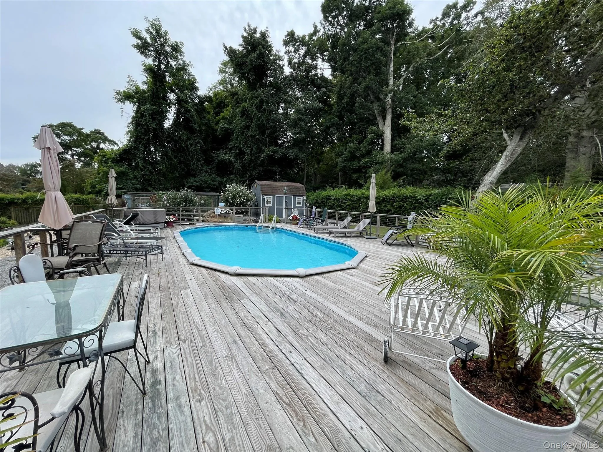 Half Inground Pool with Wrap Around Dek Half Inground Pool with Wrap Around Dek