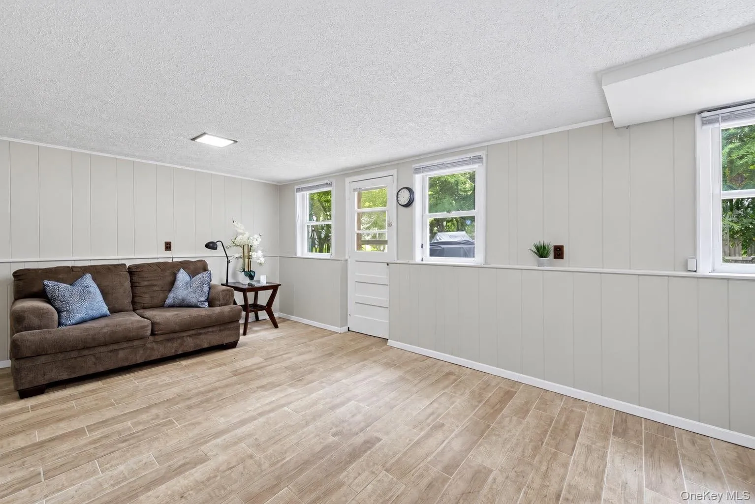 Bonus Room on Lower Level, walk out to Patio Bonus Room on Lower Level, walk out to Patio