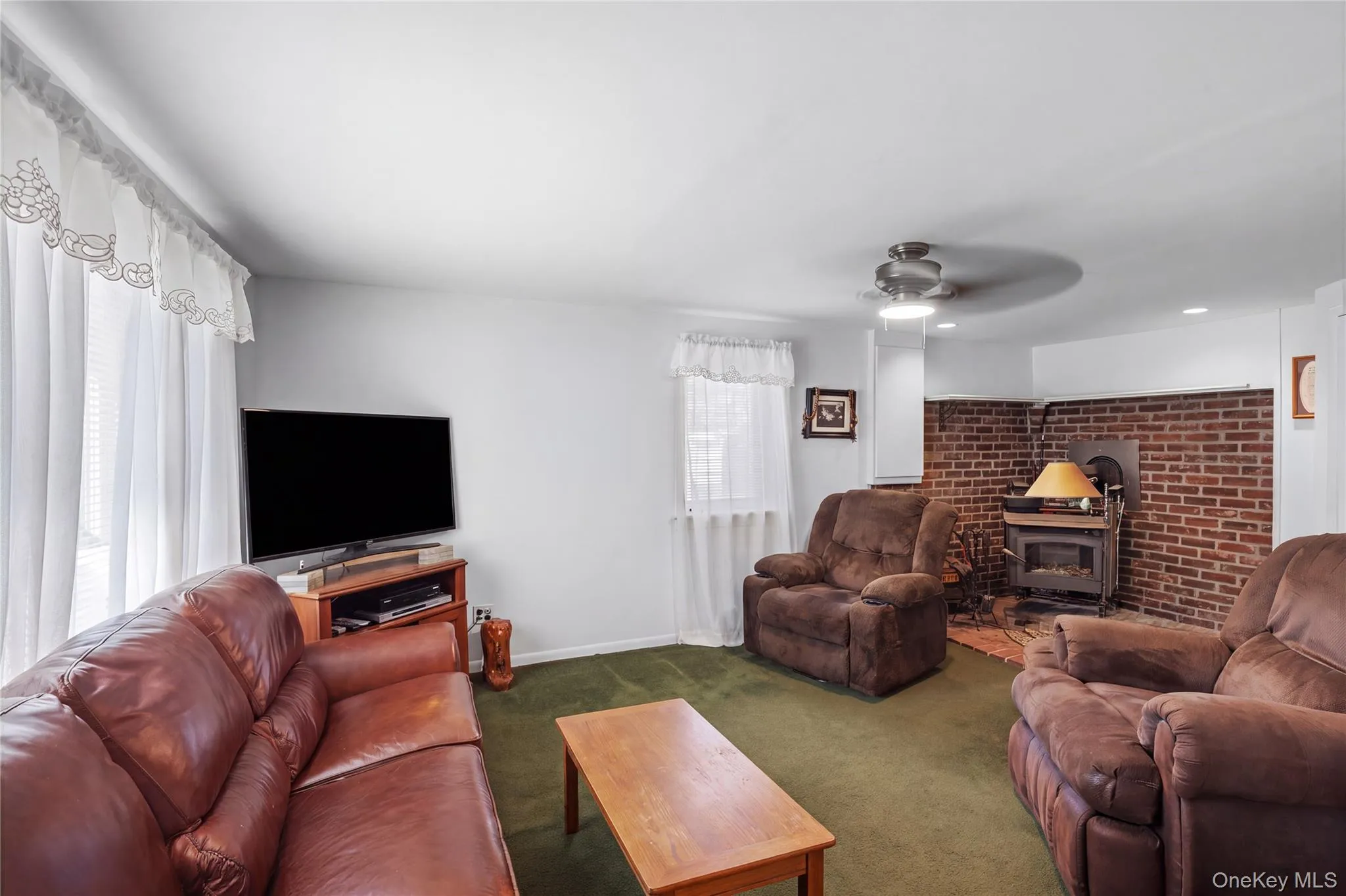 Converted garage, den with wood burning stove Converted garage, den with wood burning stove
