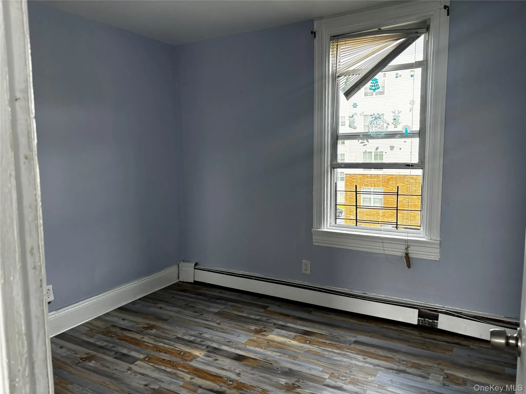 Larger Bedroom Drenched with Sunlight Larger Bedroom Drenched with Sunlight