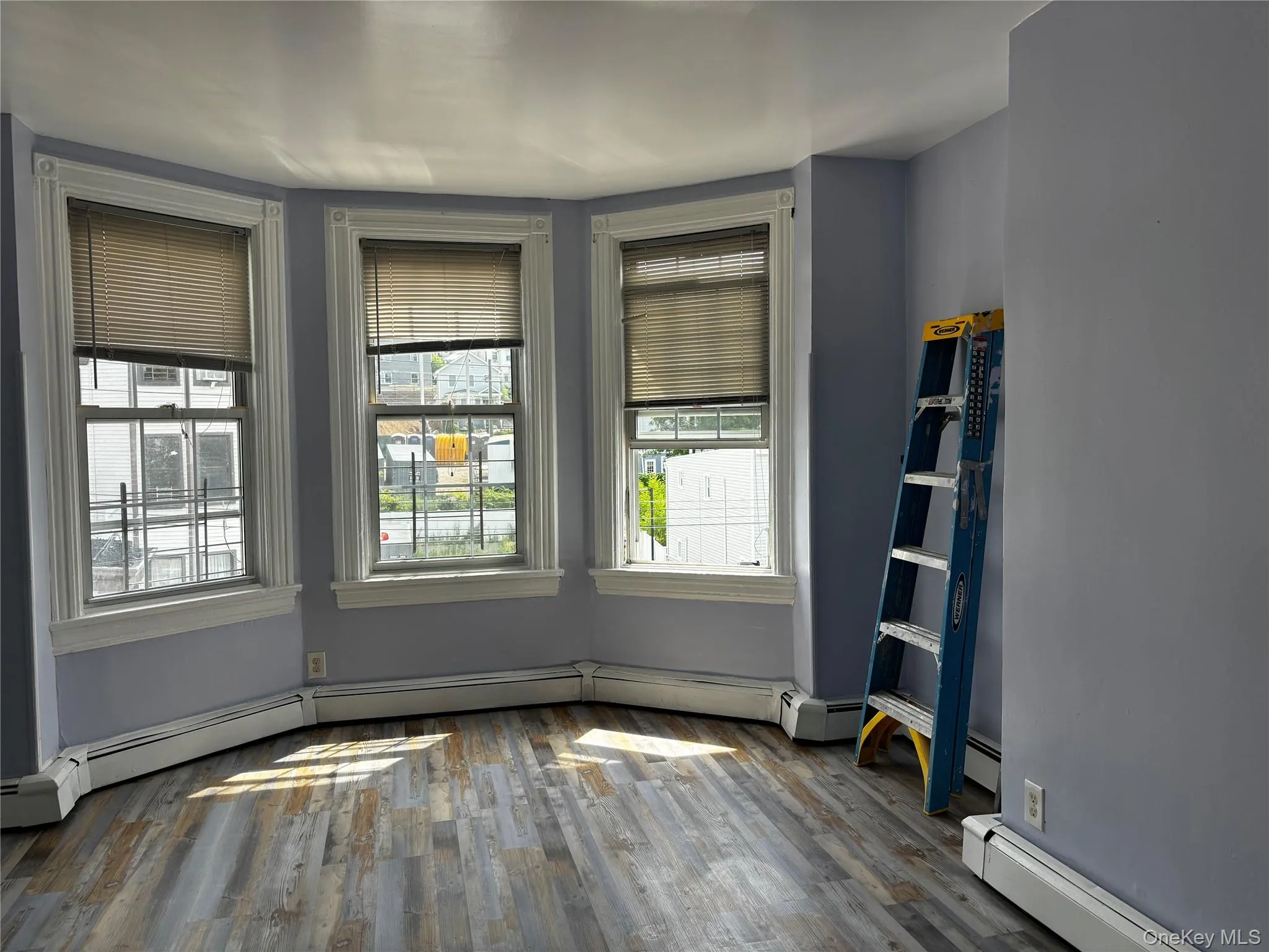 Large Bedroom Featuring Bay Windows Modern and Sun-filled Large Bedroom Featuring Bay Windows Modern and Sun-filled