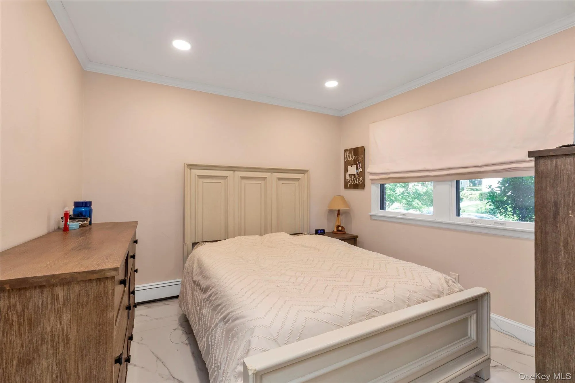 Perfect quest room or Mother-daughter with proper permits. Ground -level Bedroom #4 w/full bath on this level.Recessed ceiling lighting, crown molding, double-pane windows, and porcelain tile flooring. Perfect quest room or Mother-daughter with proper permits. Ground -level Bedroom #4 w/full bath on this level.Recessed ceiling lighting, crown molding, double-pane windows, and porcelain tile flooring.