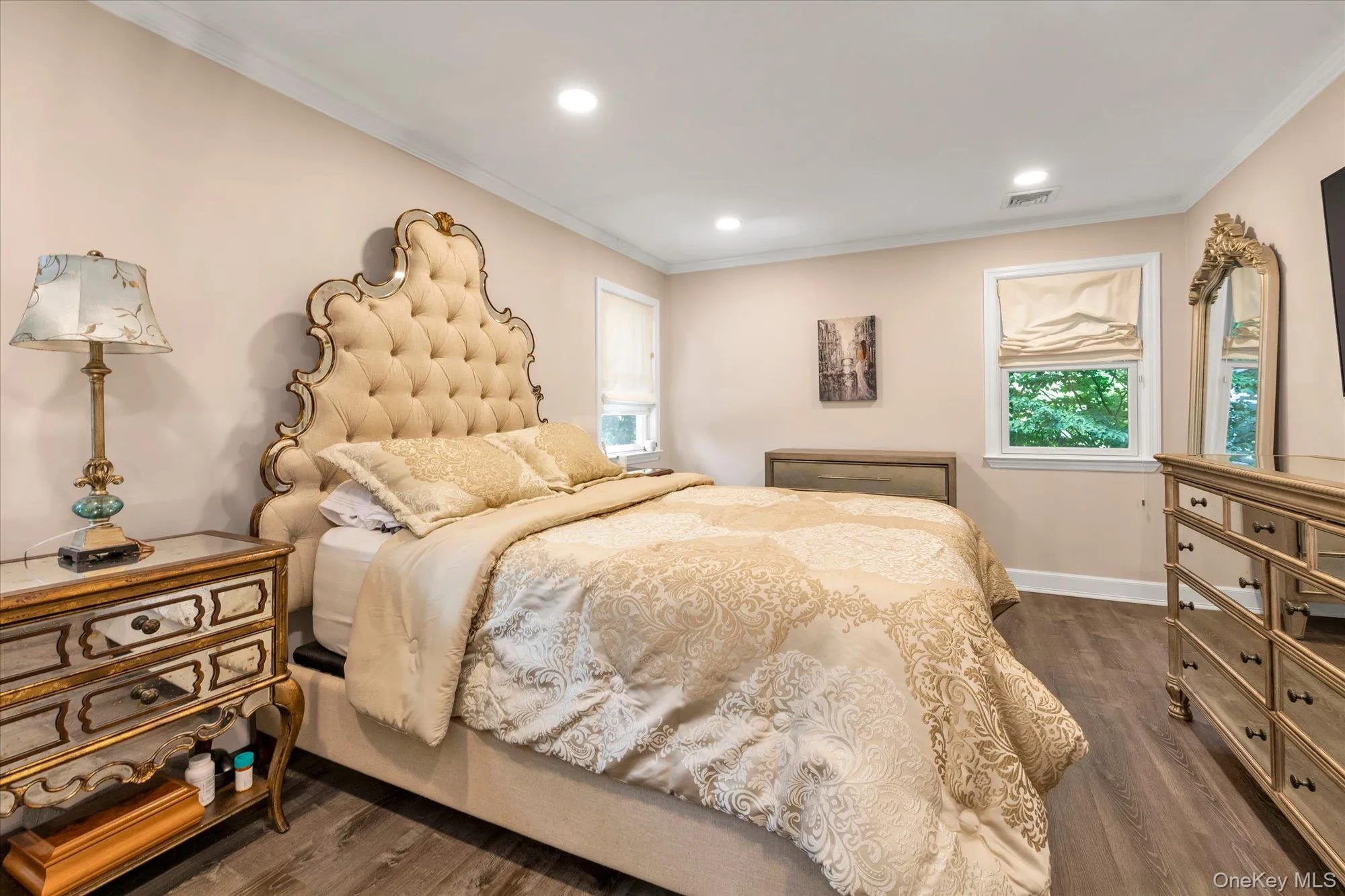 Bedroom #1Wood-finish flooring, recessed lighting, crown molding, and large walk-in closet with en-suite bath. Bedroom #1Wood-finish flooring, recessed lighting, crown molding, and large walk-in closet with en-suite bath.