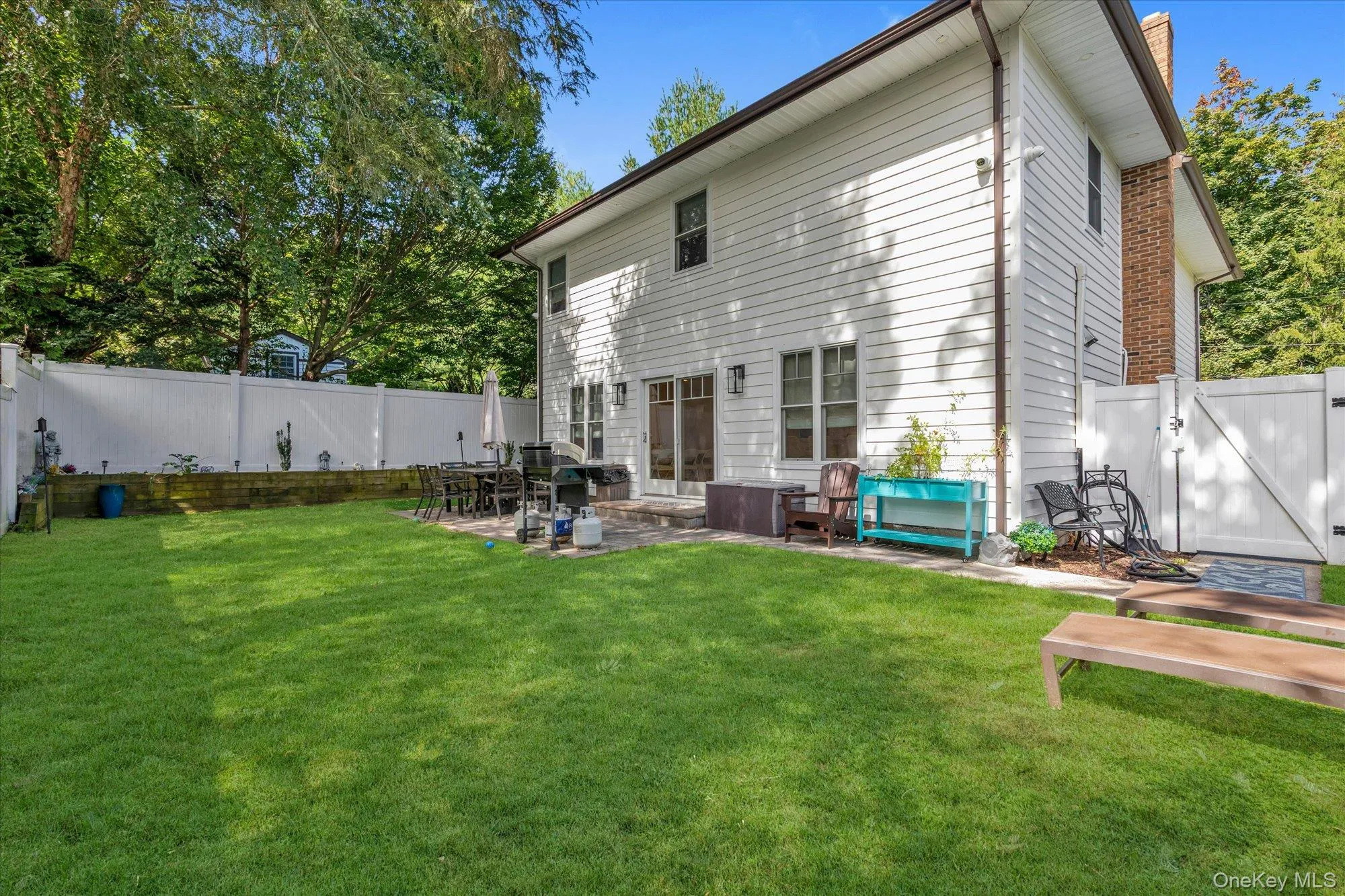 Spacious patio directly off the kitchen. Totally fenced rear yard. Spacious patio directly off the kitchen. Totally fenced rear yard.