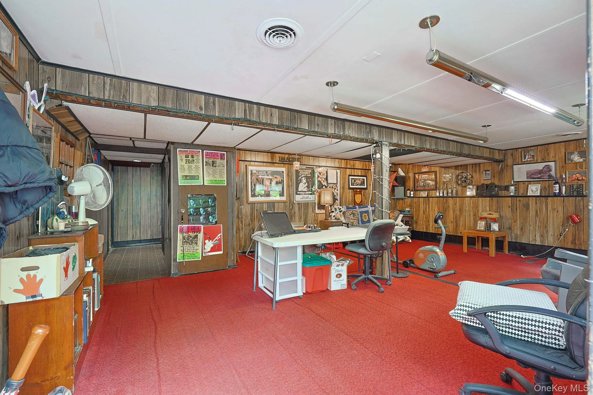 Basement flex space & wood burning stove. Basement flex space & wood burning stove.