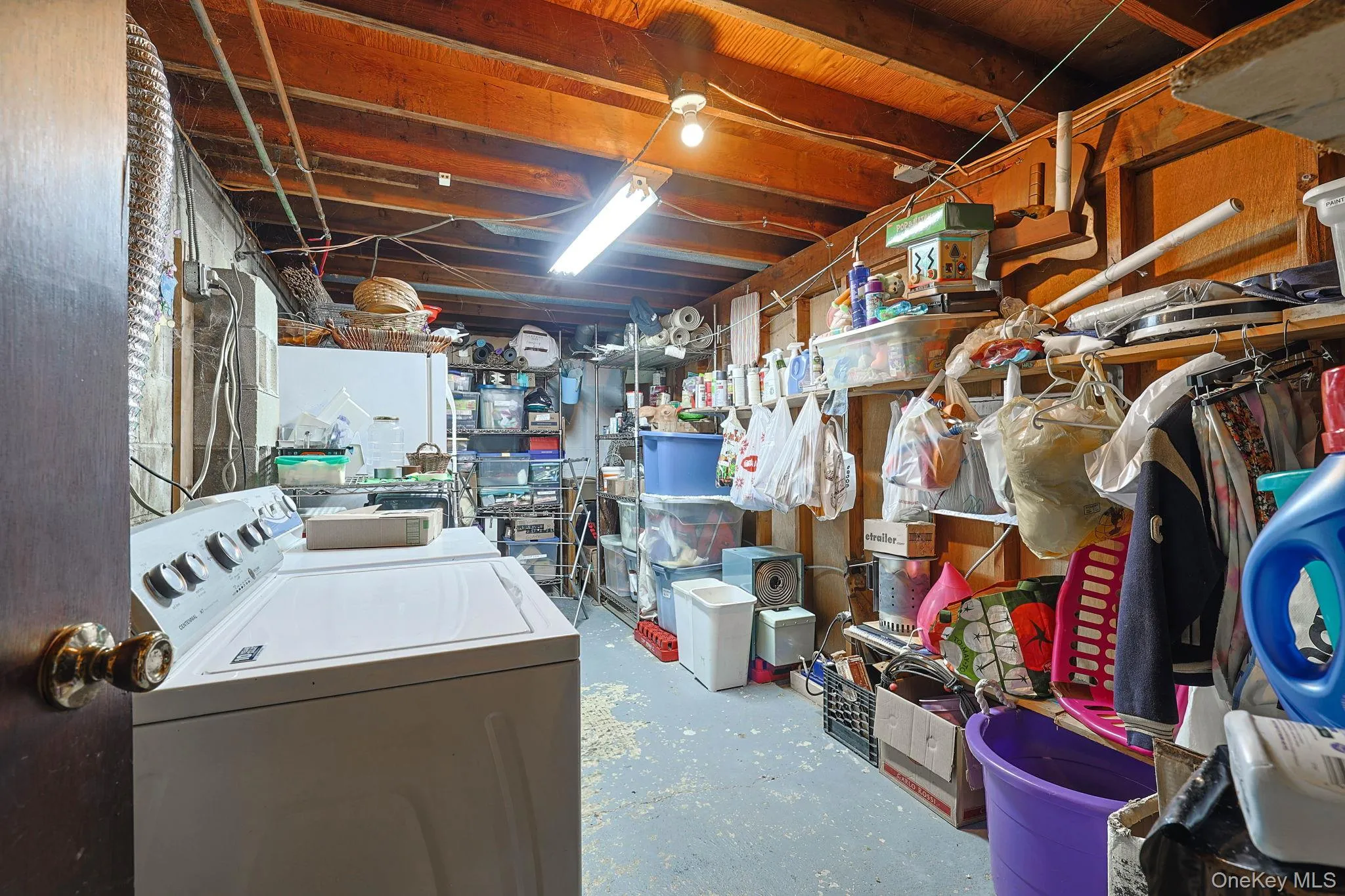 Laundry room & storage in basement. Laundry room & storage in basement.