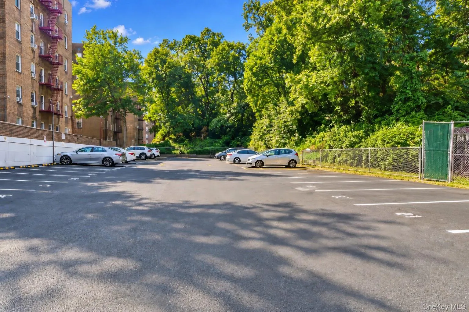New Parking Lot (to the Right of the Building) Just Redone - See Description for Parking Info New Parking Lot (to the Right of the Building) Just Redone - See Description for Parking Info