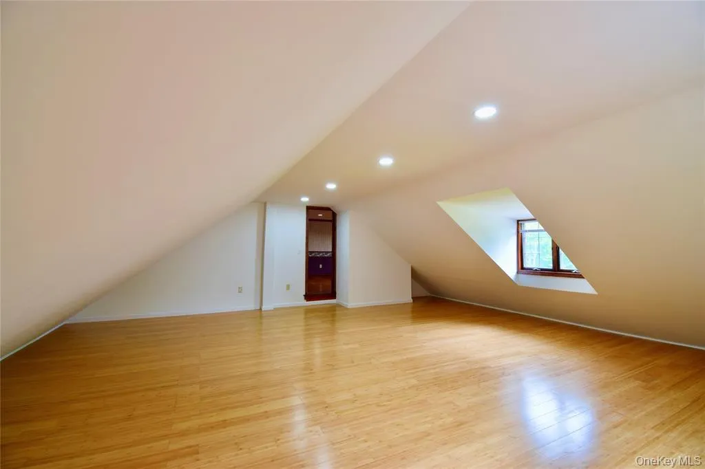 Bonus room with bamboo flooring. Bonus room with bamboo flooring.