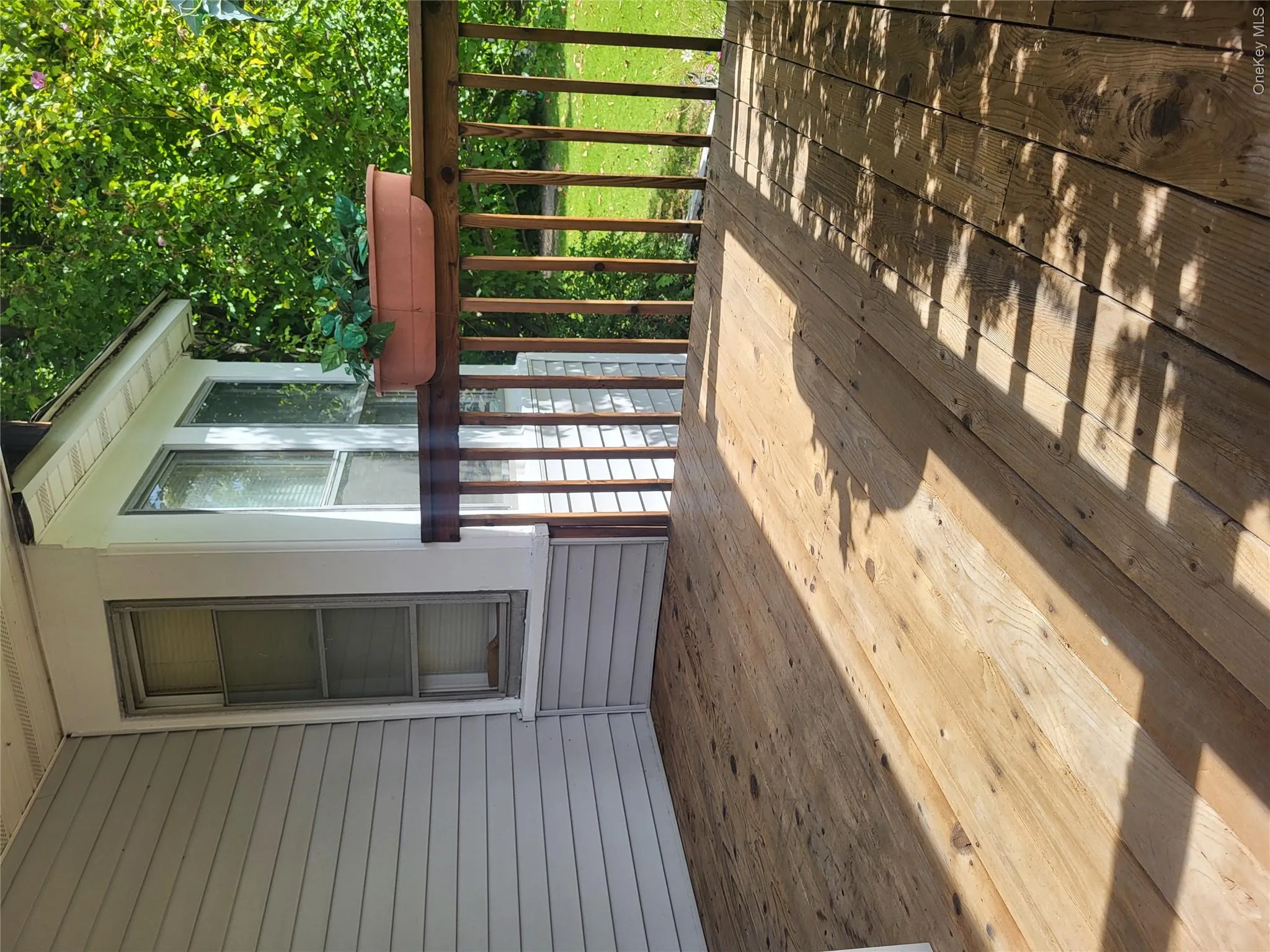 Covered deck on front porch Covered deck on front porch