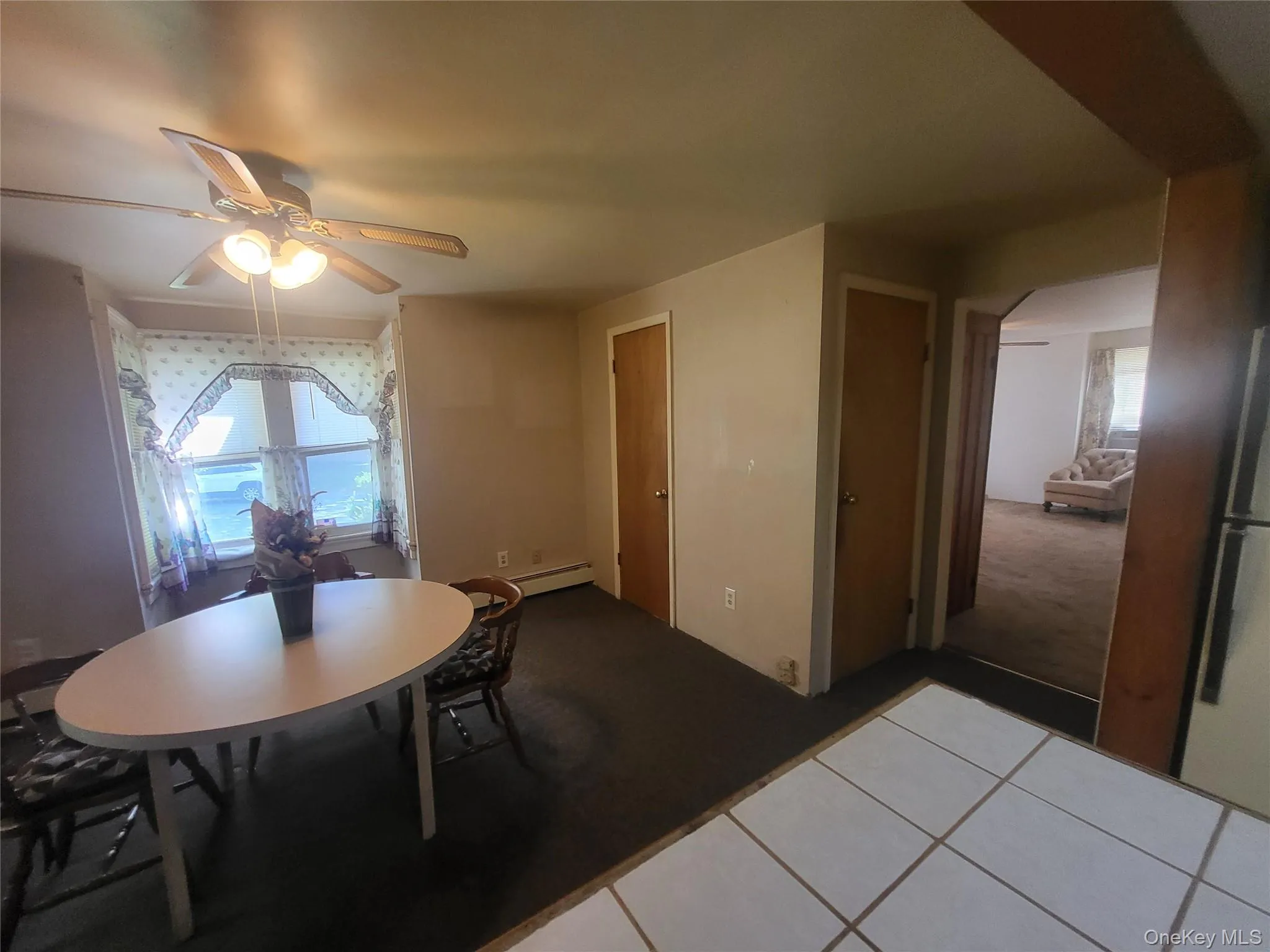 Kitchen opens to dining room Kitchen opens to dining room