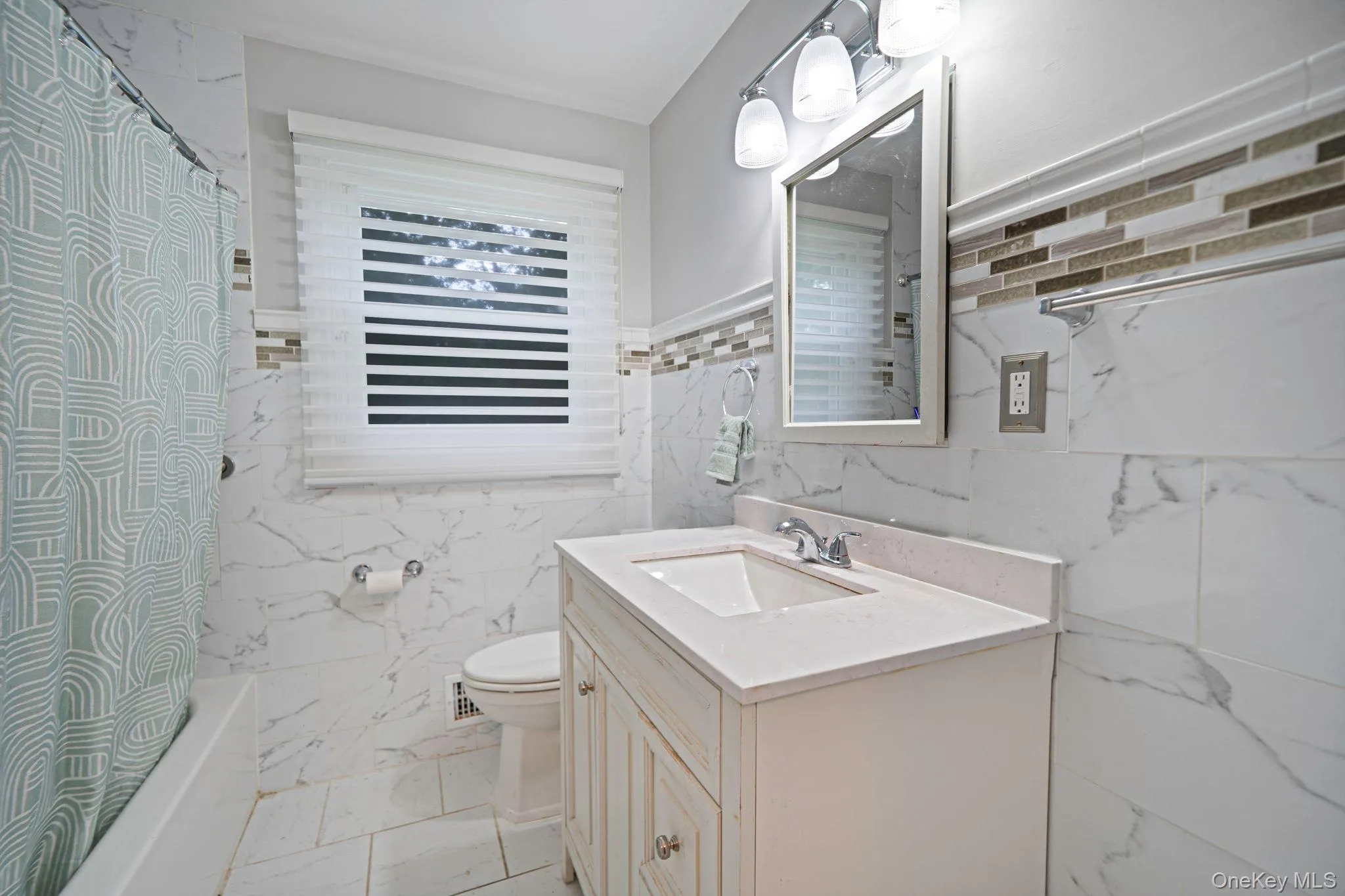 Hall bath, tub/shower, single sink vanity Hall bath, tub/shower, single sink vanity