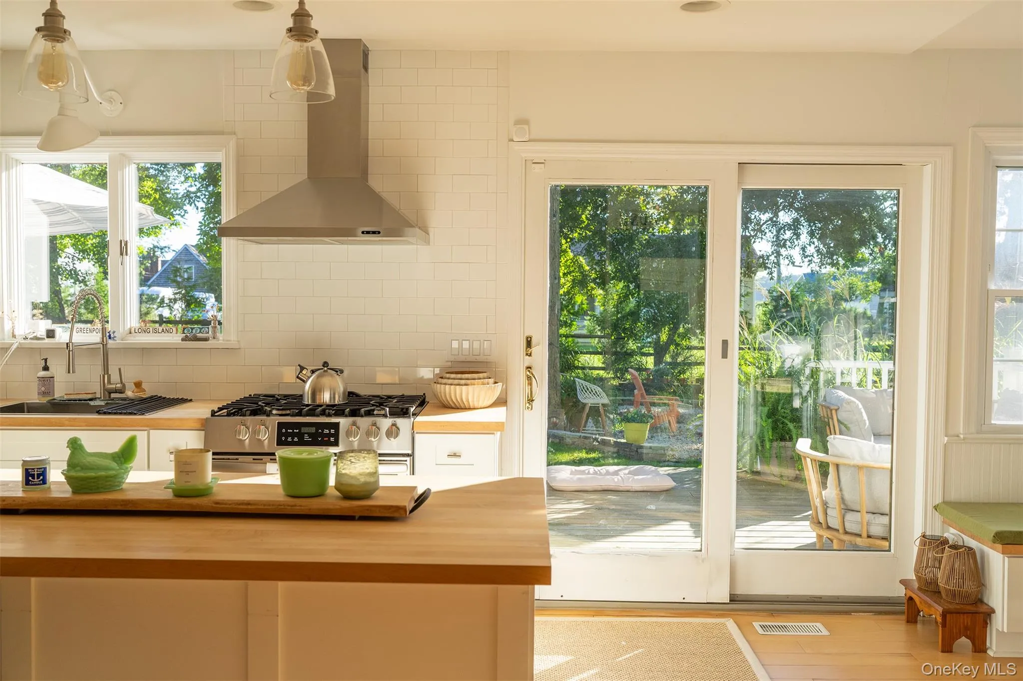 Filled with morning light and kitchen has beautiful butcher block counter tops Filled with morning light and kitchen has beautiful butcher block counter tops