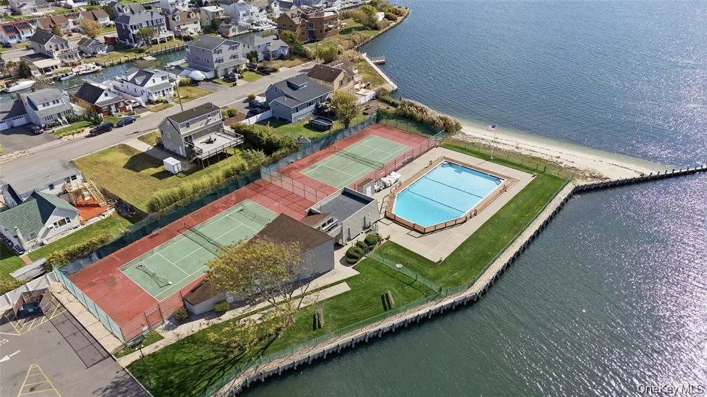 Aeriel View of the Pool & Tennis Courts Aeriel View of the Pool & Tennis Courts
