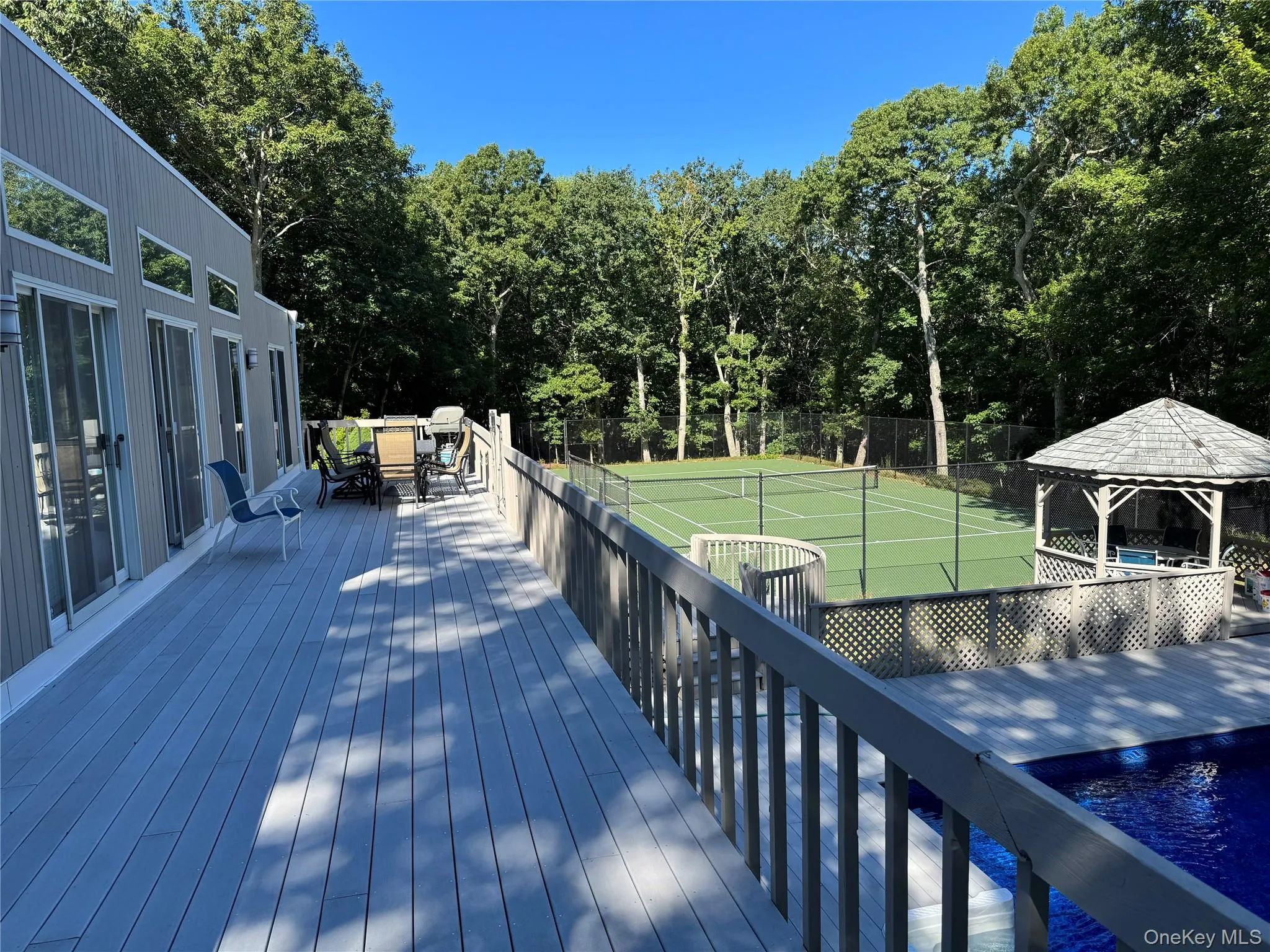 Entertaining deck that runs the full length of the house/ Entertaining deck that runs the full length of the house/