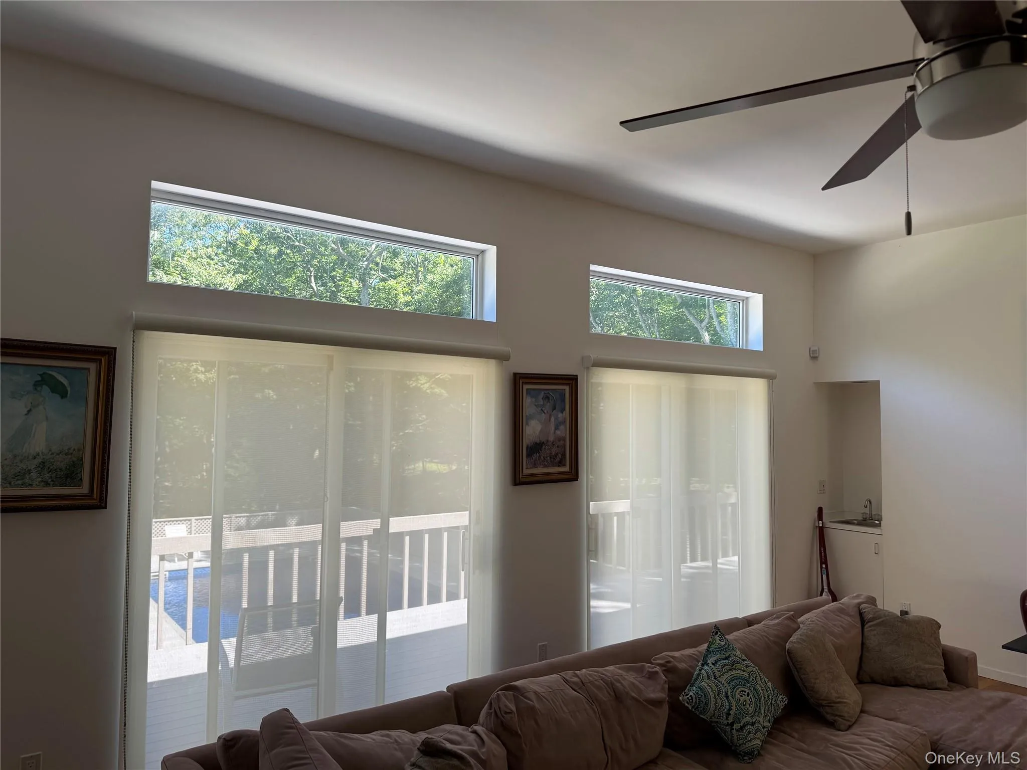 Sun-filled entertaining with wall of windows. Sun-filled entertaining with wall of windows.