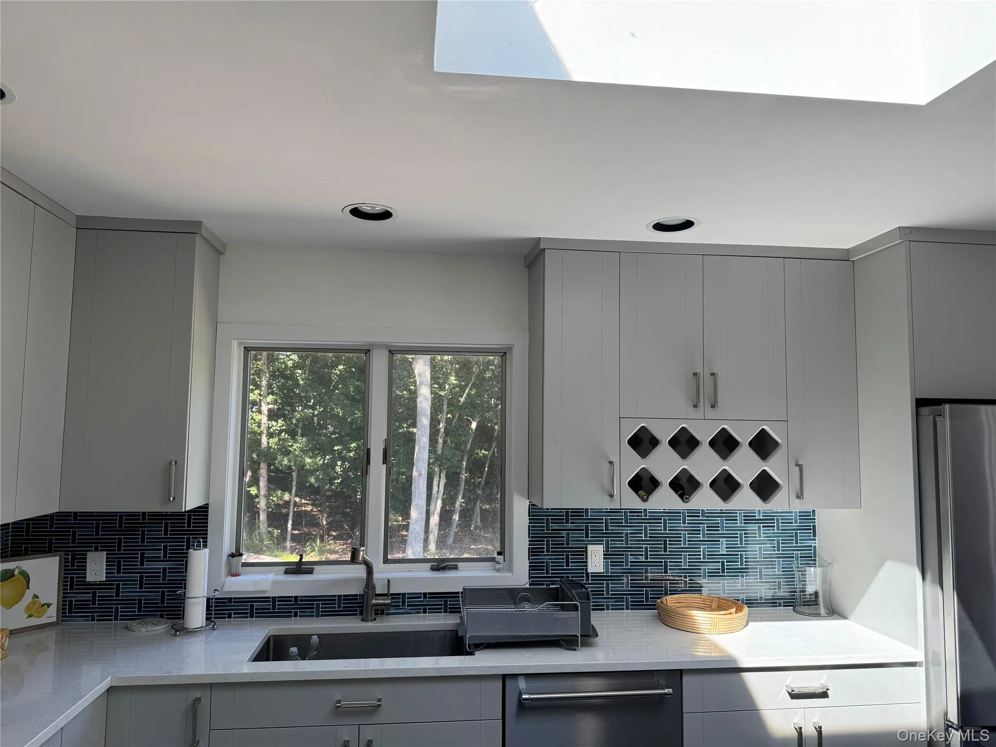 Recently renovated kitchen with island. Recently renovated kitchen with island.