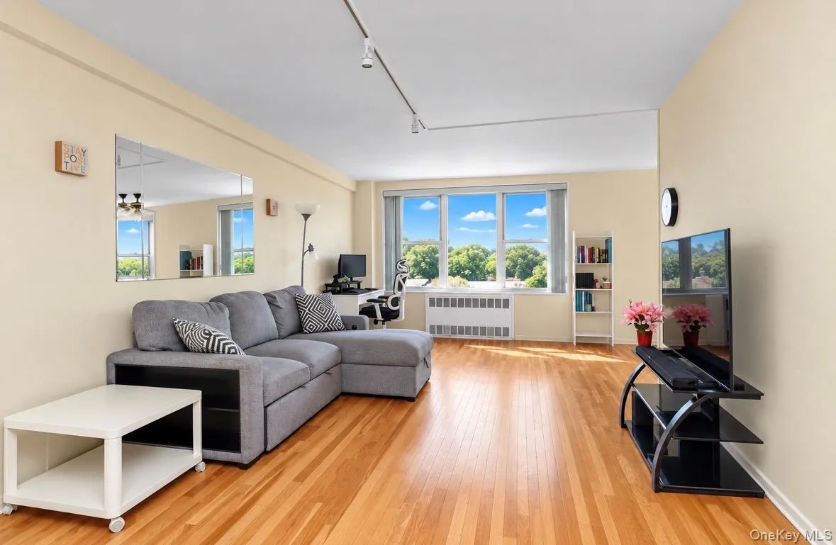 Spacious Open-Layout Living Room and Dining Alcove Spacious Open-Layout Living Room and Dining Alcove