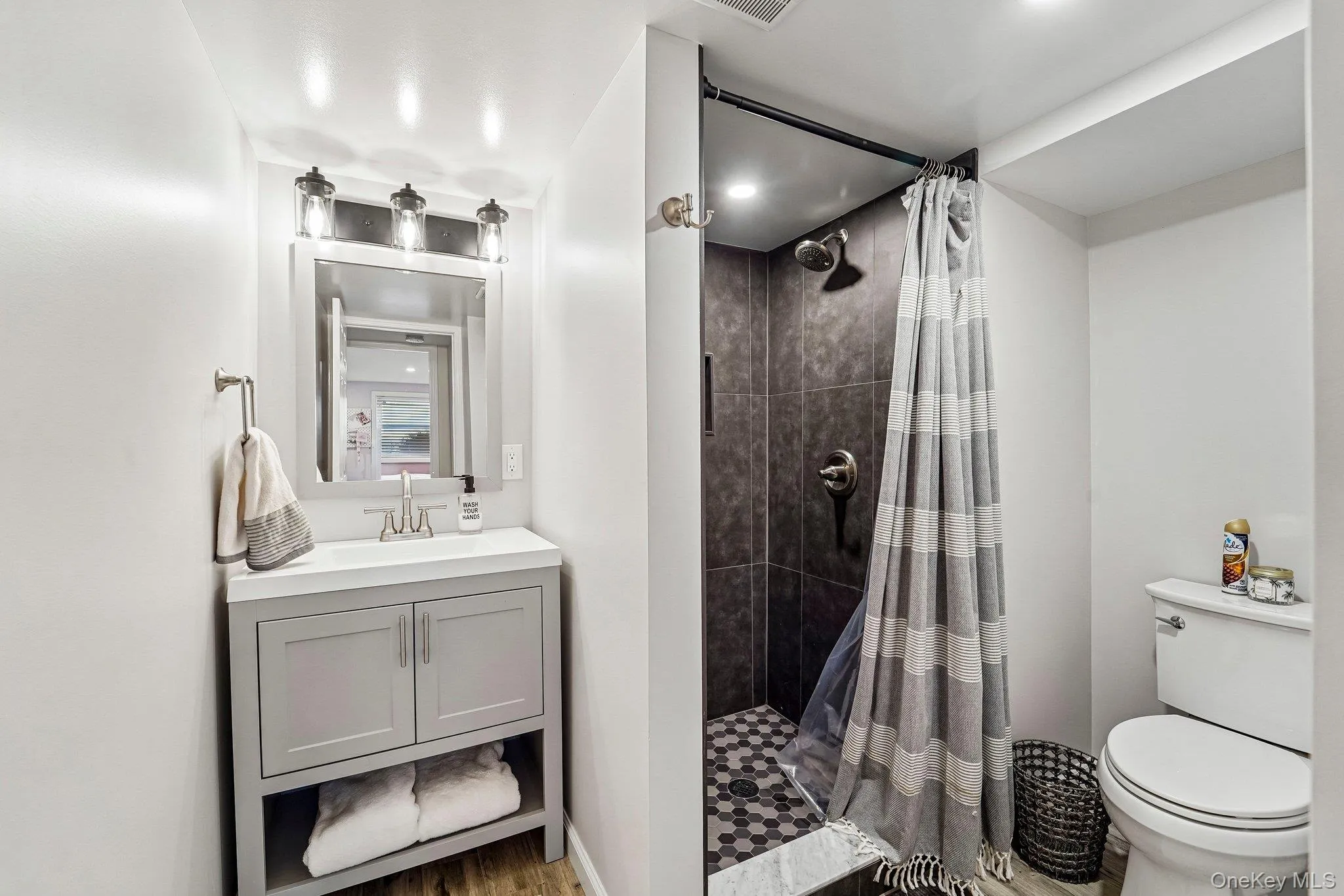 Full bath in basement. Full bath in basement.