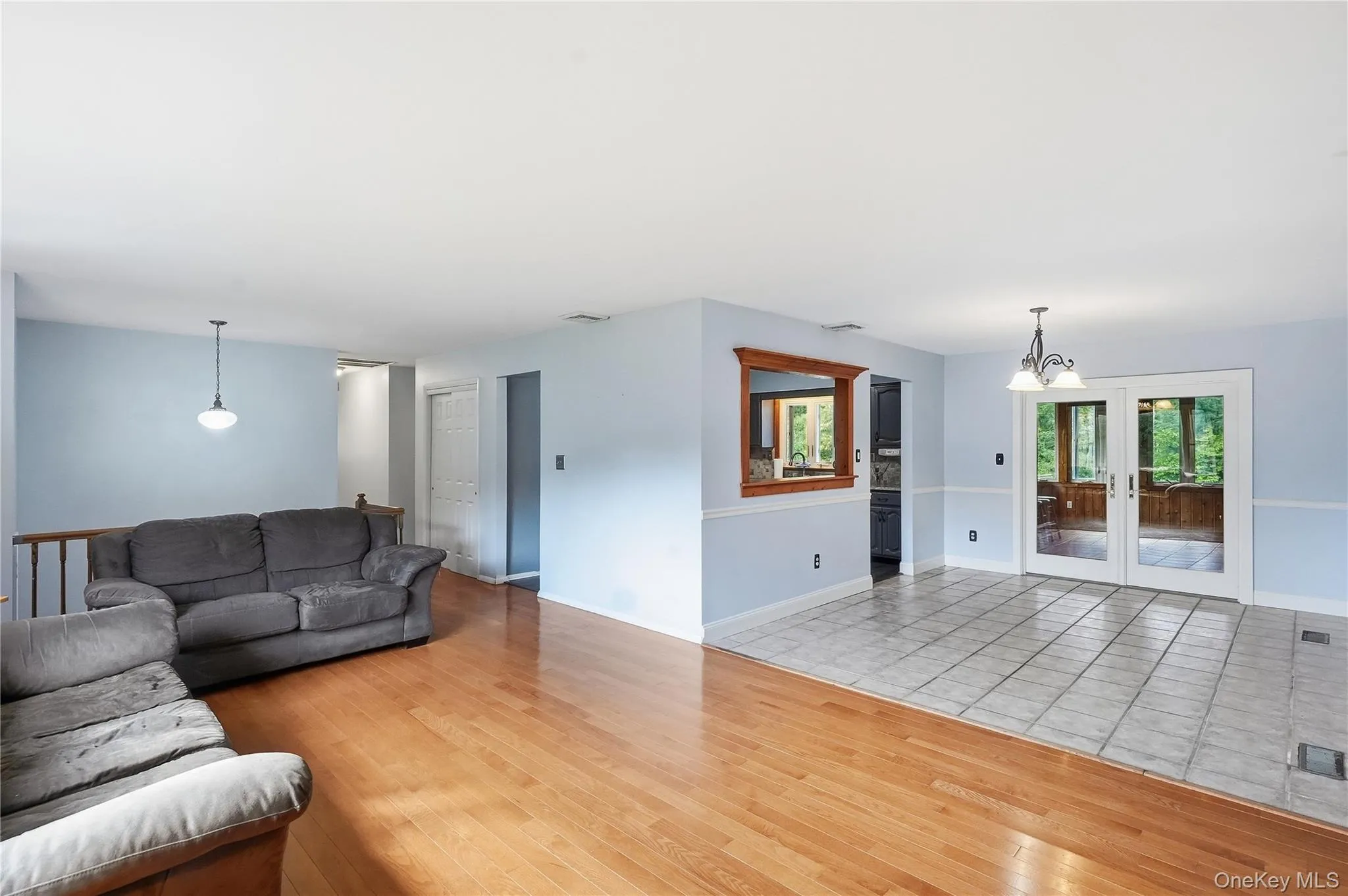 Living room flows to formal dining room Living room flows to formal dining room