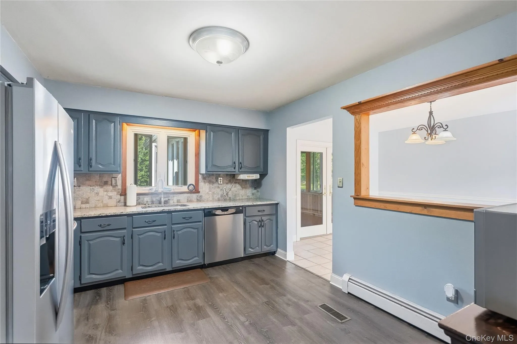 Kitchen flows right off dining room Kitchen flows right off dining room