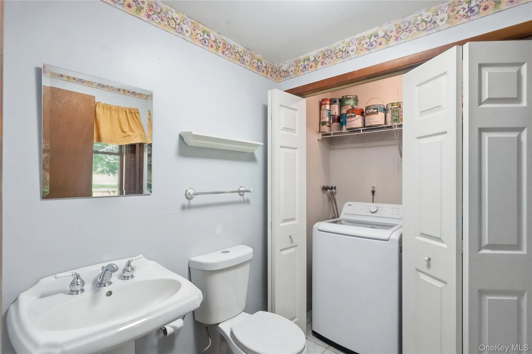 Half bath and laundry room in lower level Half bath and laundry room in lower level