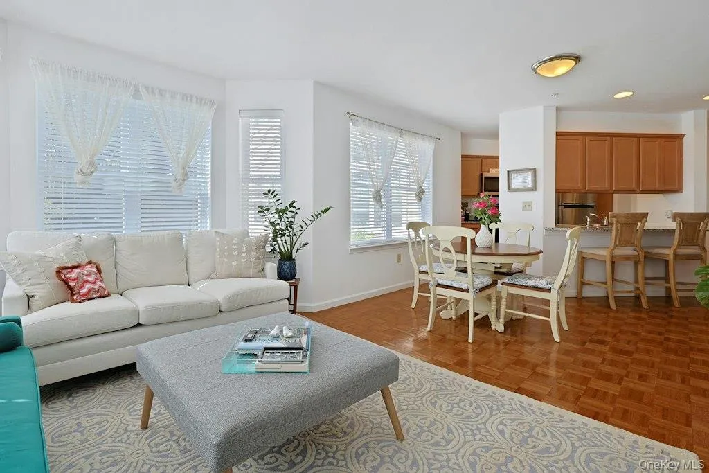 Living Room and Dining Area overlooks Breakfast Bar Living Room and Dining Area overlooks Breakfast Bar