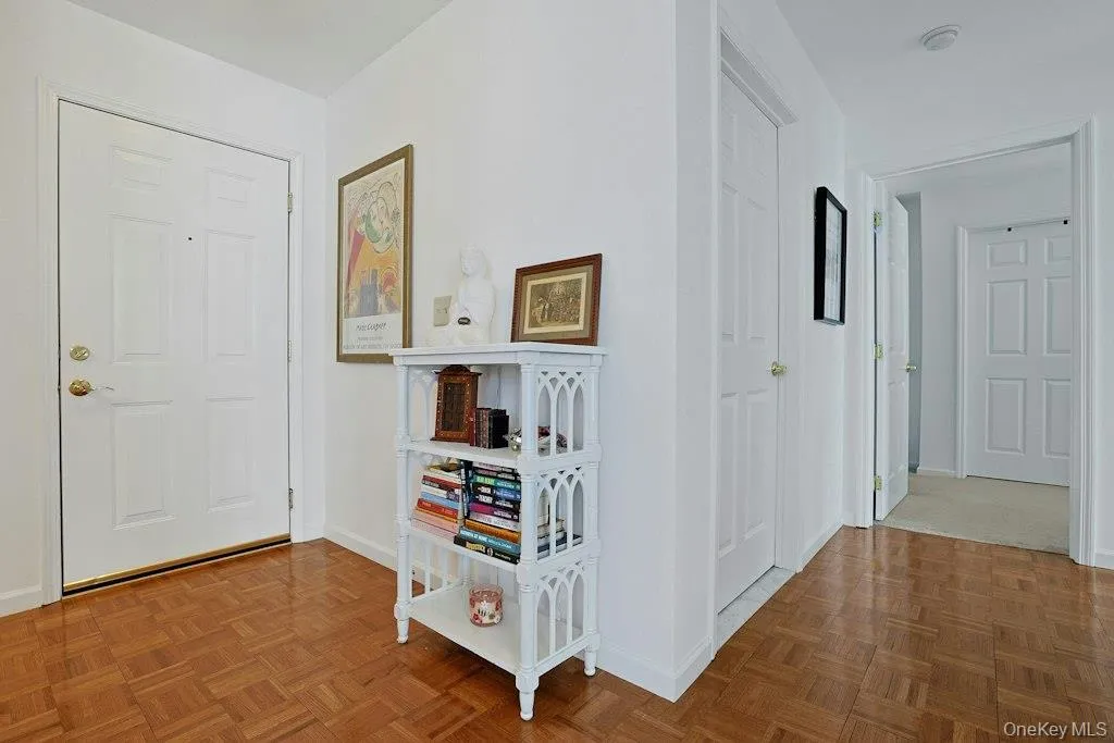 Spacious Laundry Closet with Storage in Hall Spacious Laundry Closet with Storage in Hall