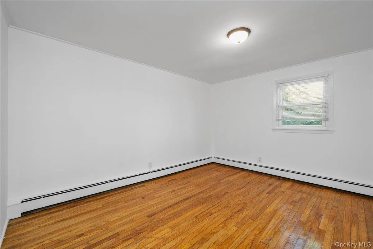 2nd bedroom - freshly painted and hardwood floors. 2nd bedroom - freshly painted and hardwood floors.