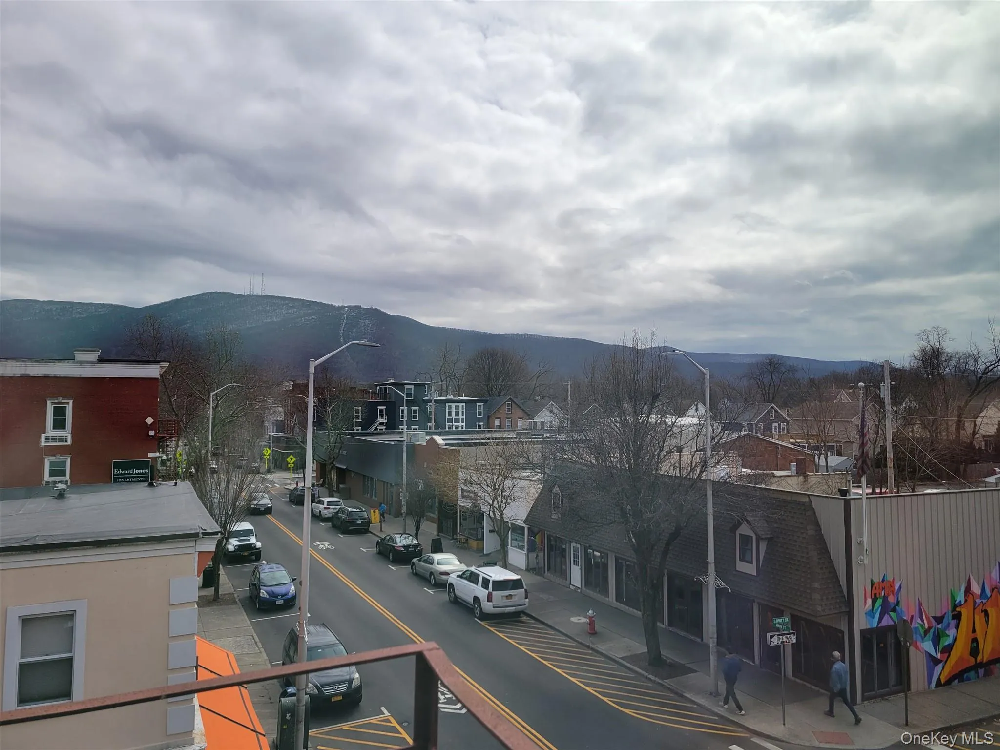 View of mountain background with nearby suburban area View of mountain background with nearby suburban area