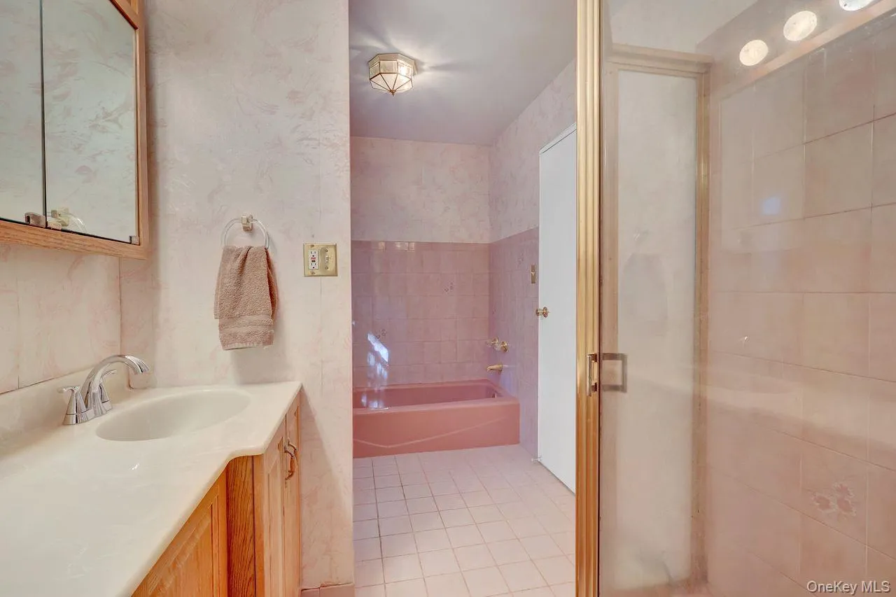 From the Primary Bedroom with access to the main hall bathroom From the Primary Bedroom with access to the main hall bathroom
