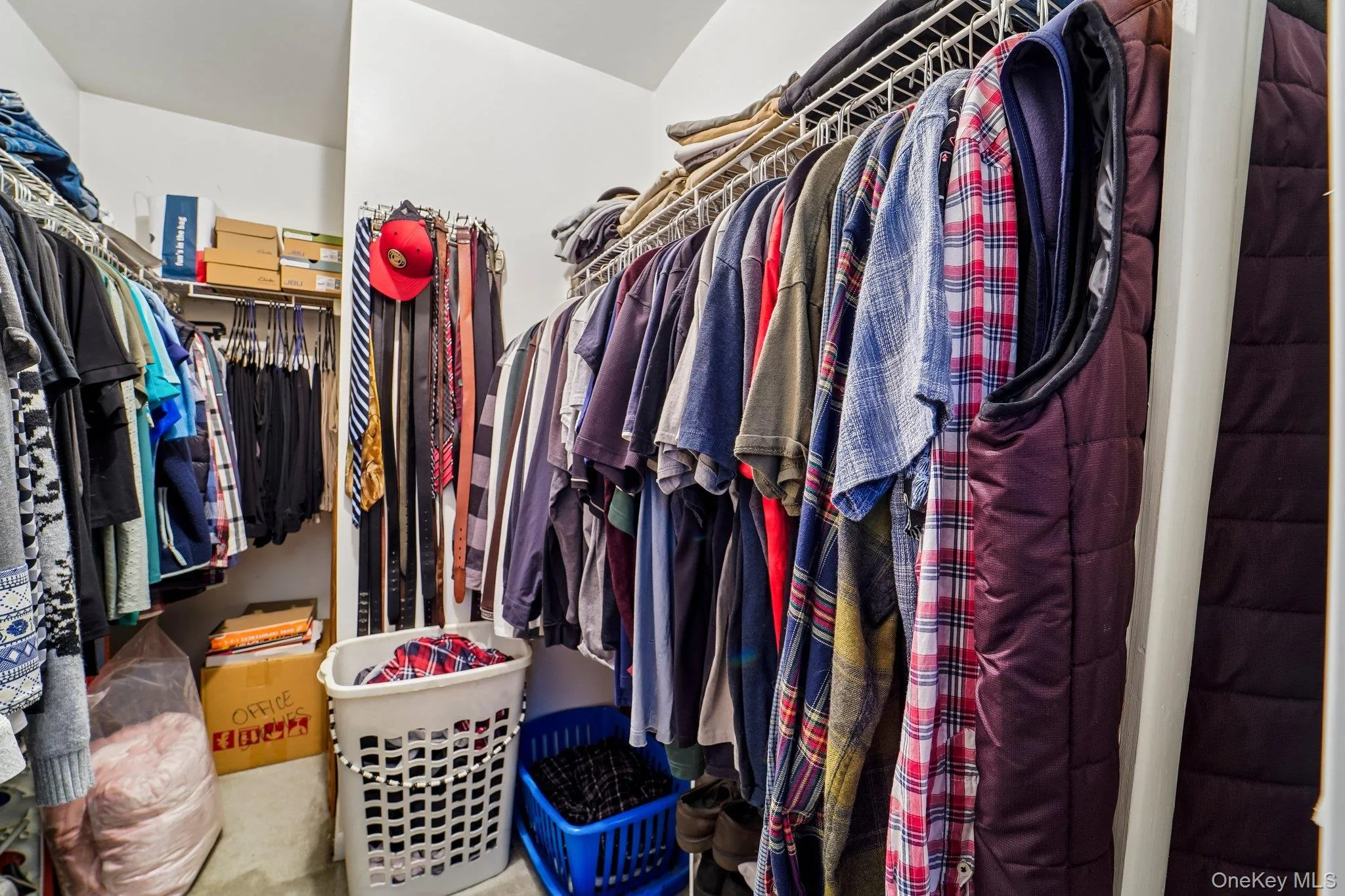 Walk in closet in Primary Bedroom Walk in closet in Primary Bedroom