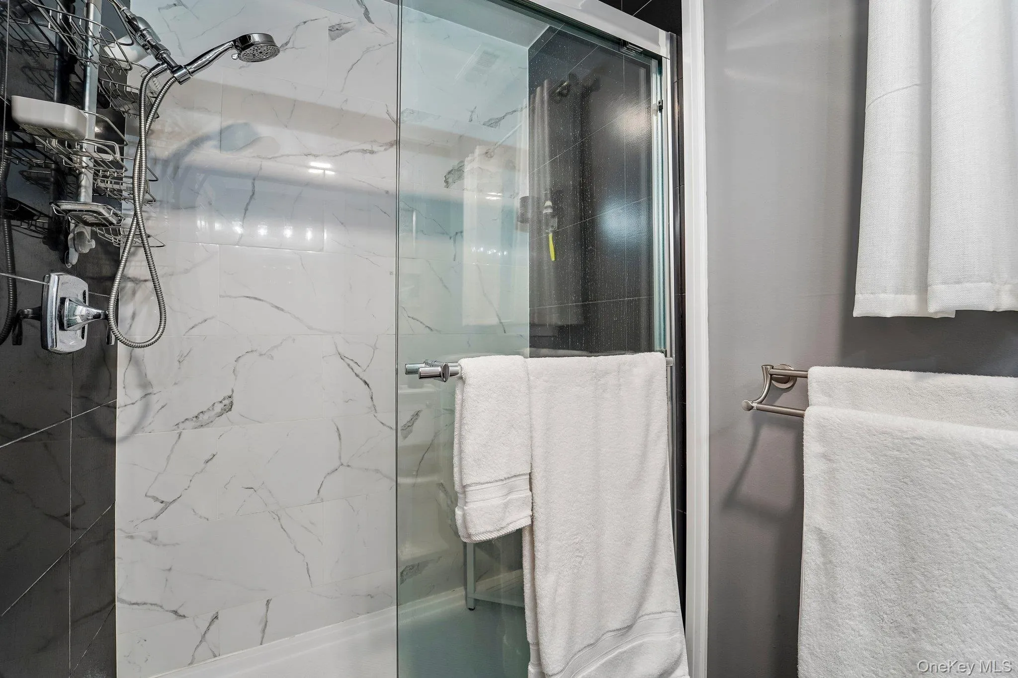 Full shower with glass door Full shower with glass door