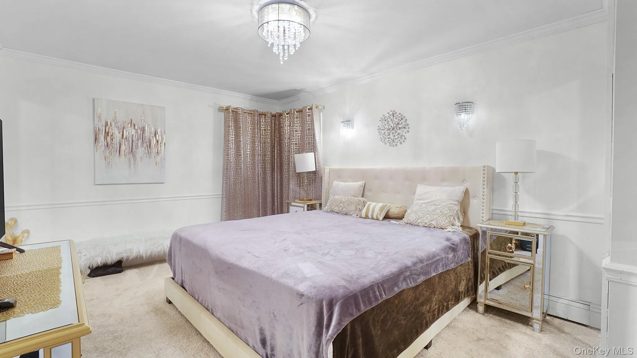 Bedroom with crown molding, carpet flooring, and a chandelier Bedroom with crown molding, carpet flooring, and a chandelier